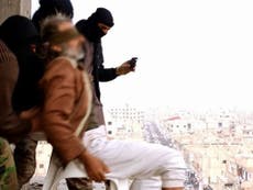 ISIS IMAGES SHOW MAN 'THROWN FROM BUILDING FOR BEING GAY'