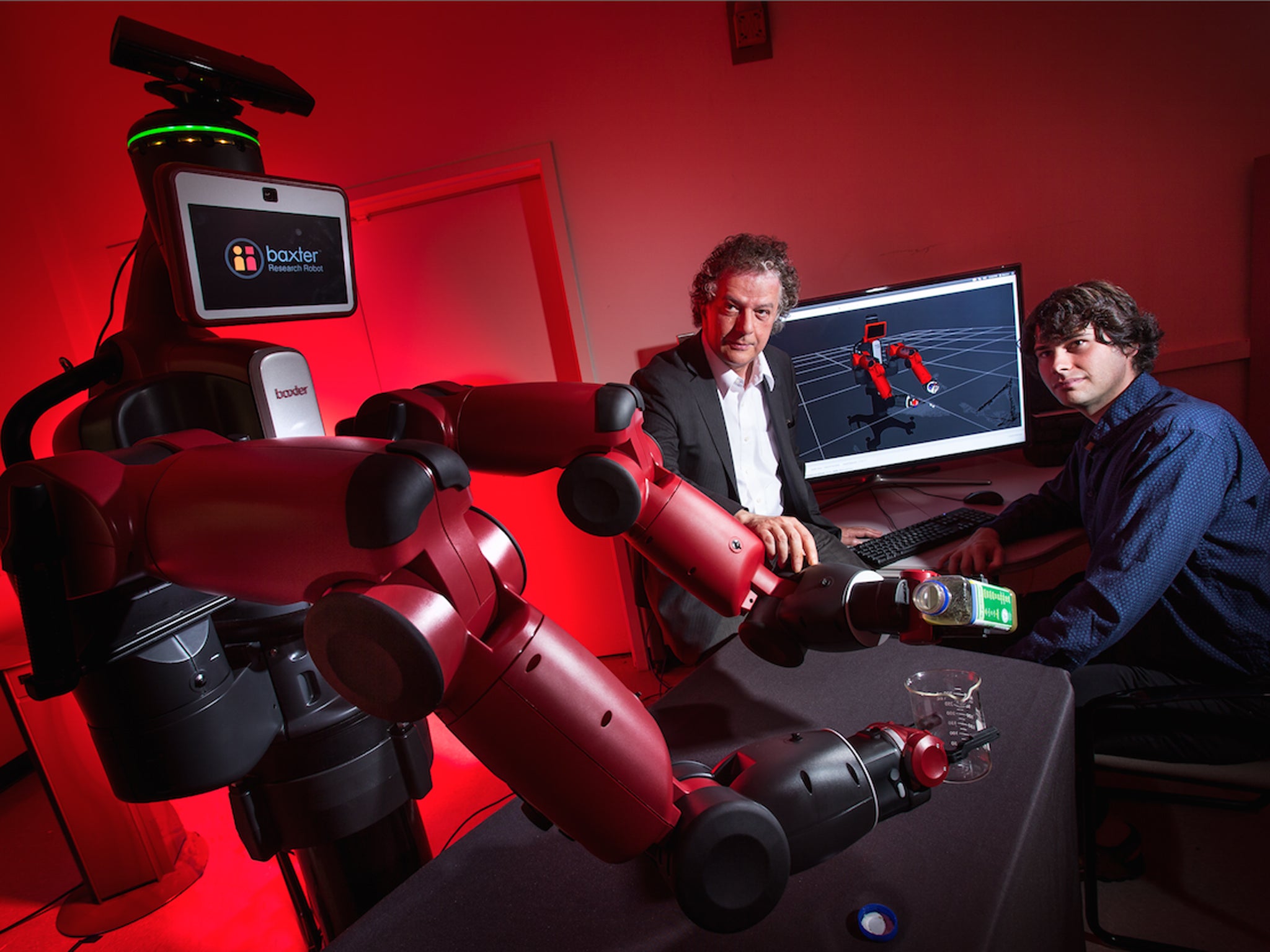 University of Maryland computer scientist Yiannis Aloimonos (center) is developing robotic systems able to visually recognize objects and generate new behavior based on those observations