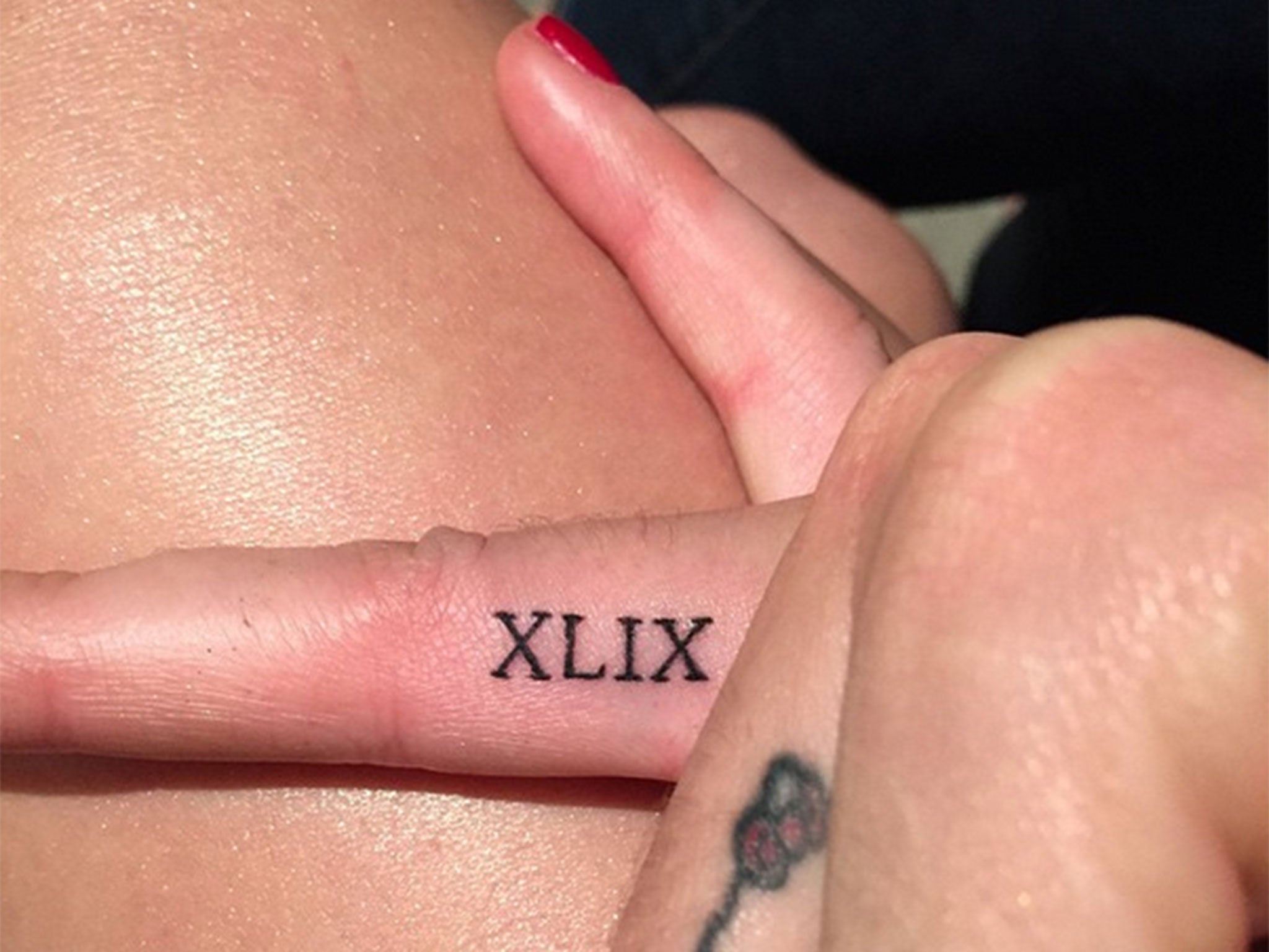 Katy Perry celebrates her Super Bowl gig with a tattoo