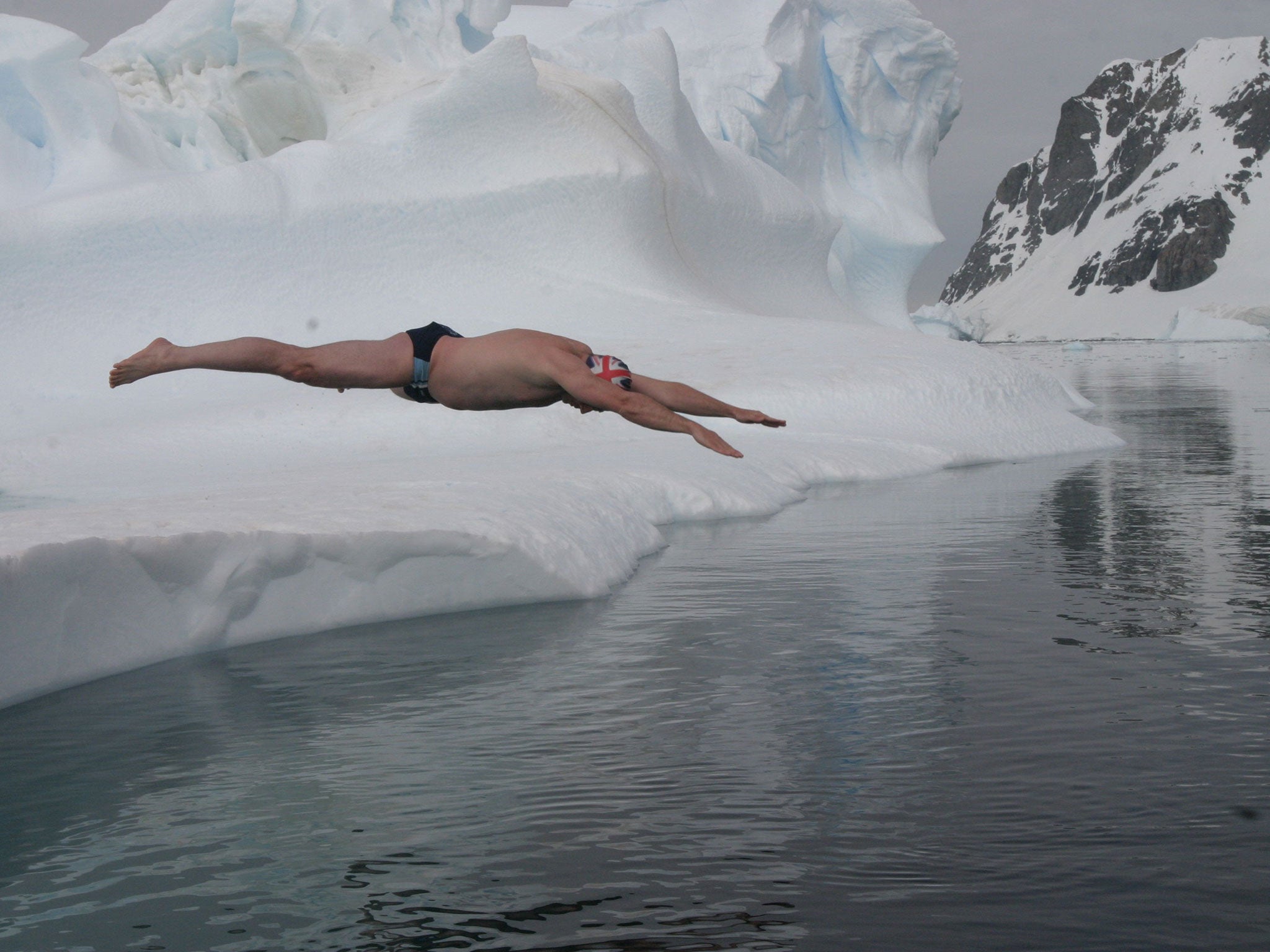 Lewis Pugh diving into the Artic Ocean