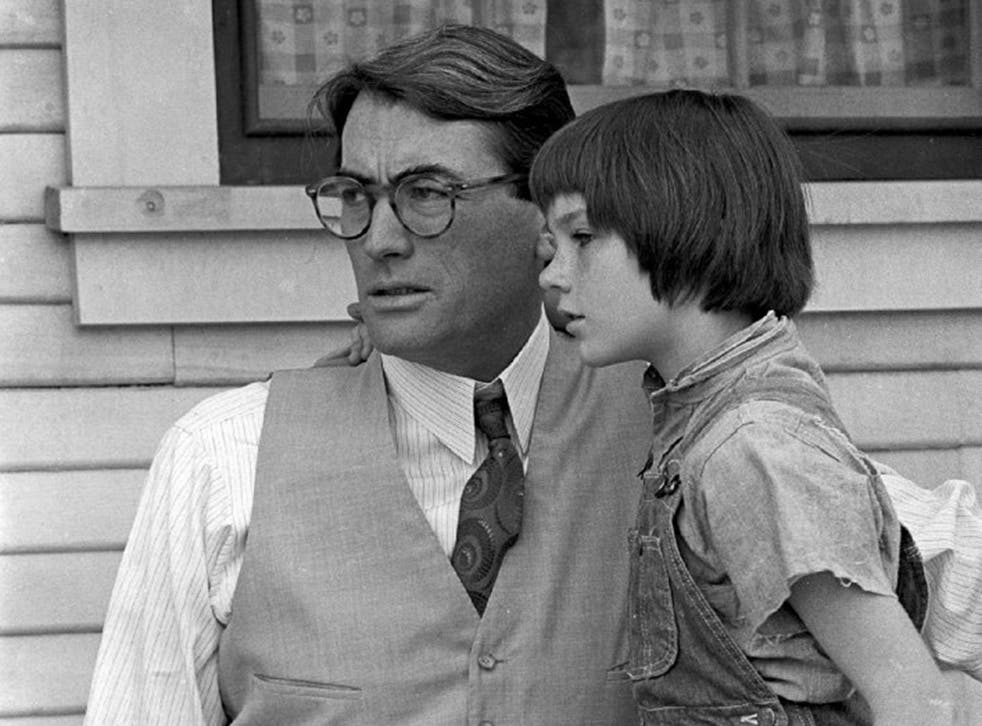 Gregory Peck and Mary Badham as Atticus and Scout in the 1962 film of Harper Lee's To Kill a Mockingbird