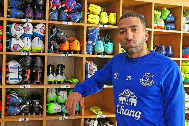 Aaron Lennon doesn't do smiles for the camera