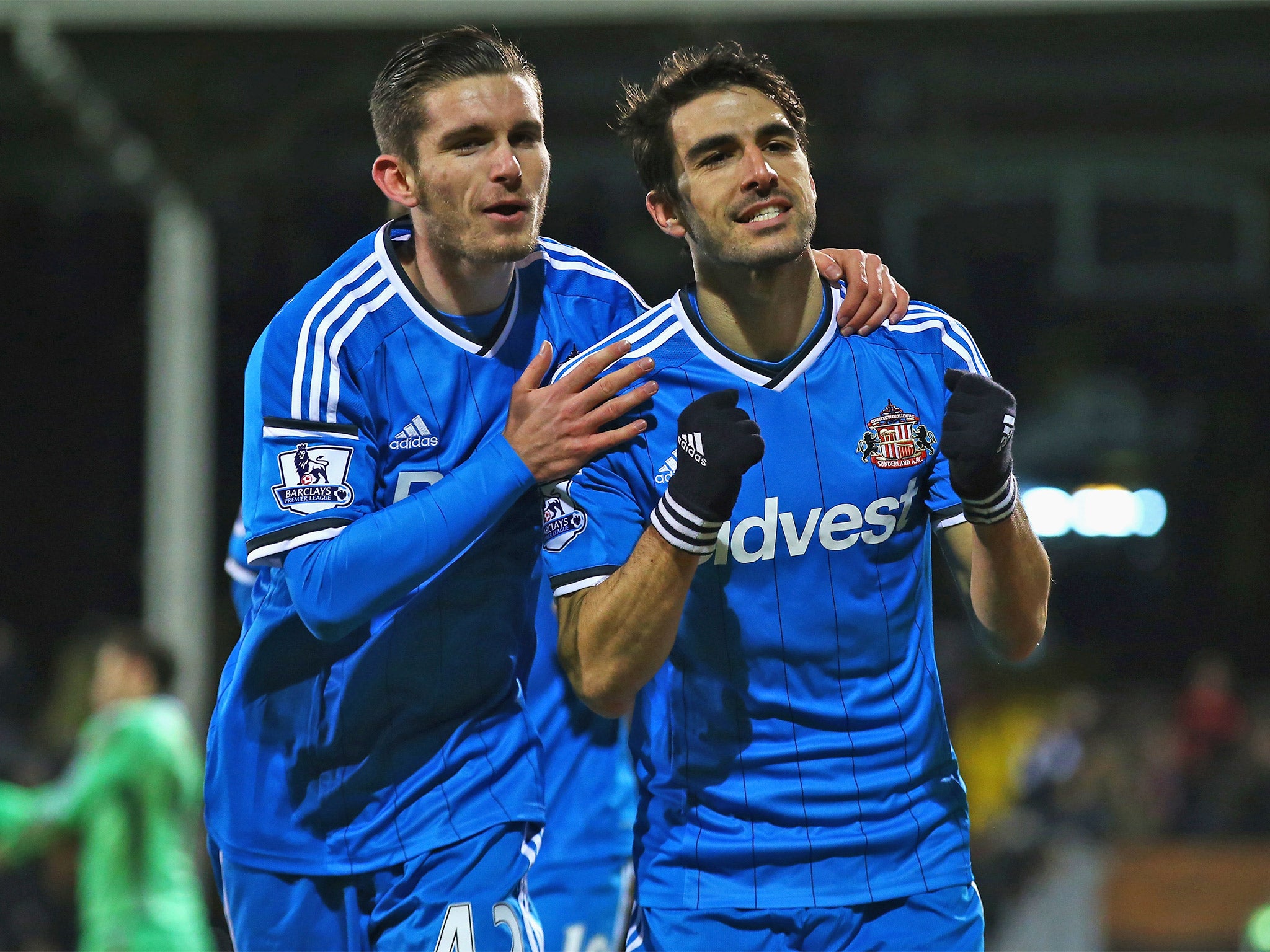 Jordi Gomez, right, celebrates with Liam Agnew after scoring a late penalty