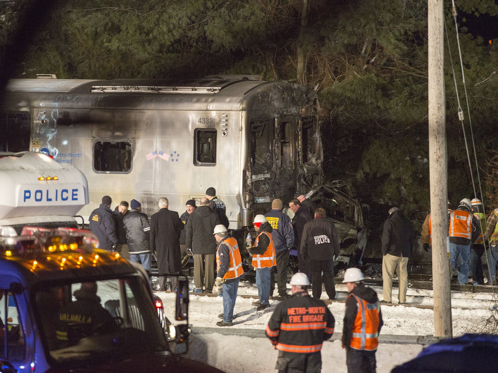 A Metro-North commutor train carrying hundreds of passengers struck a vehicle at a railroad crossing killing at least seven people and injuring many more