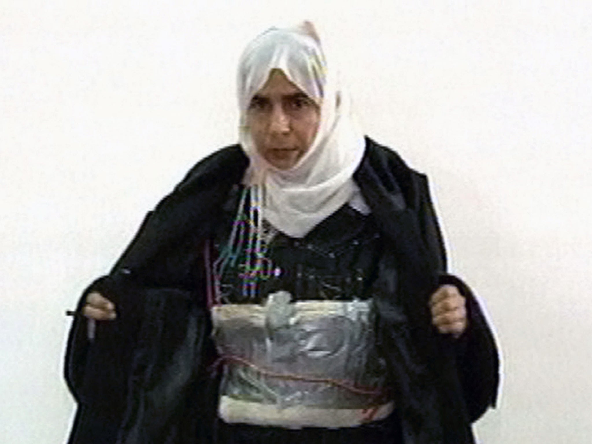 Jordanian TV showed pictures of failed suicide bomber Sajida al-Rishawi wearing an explosive vest.