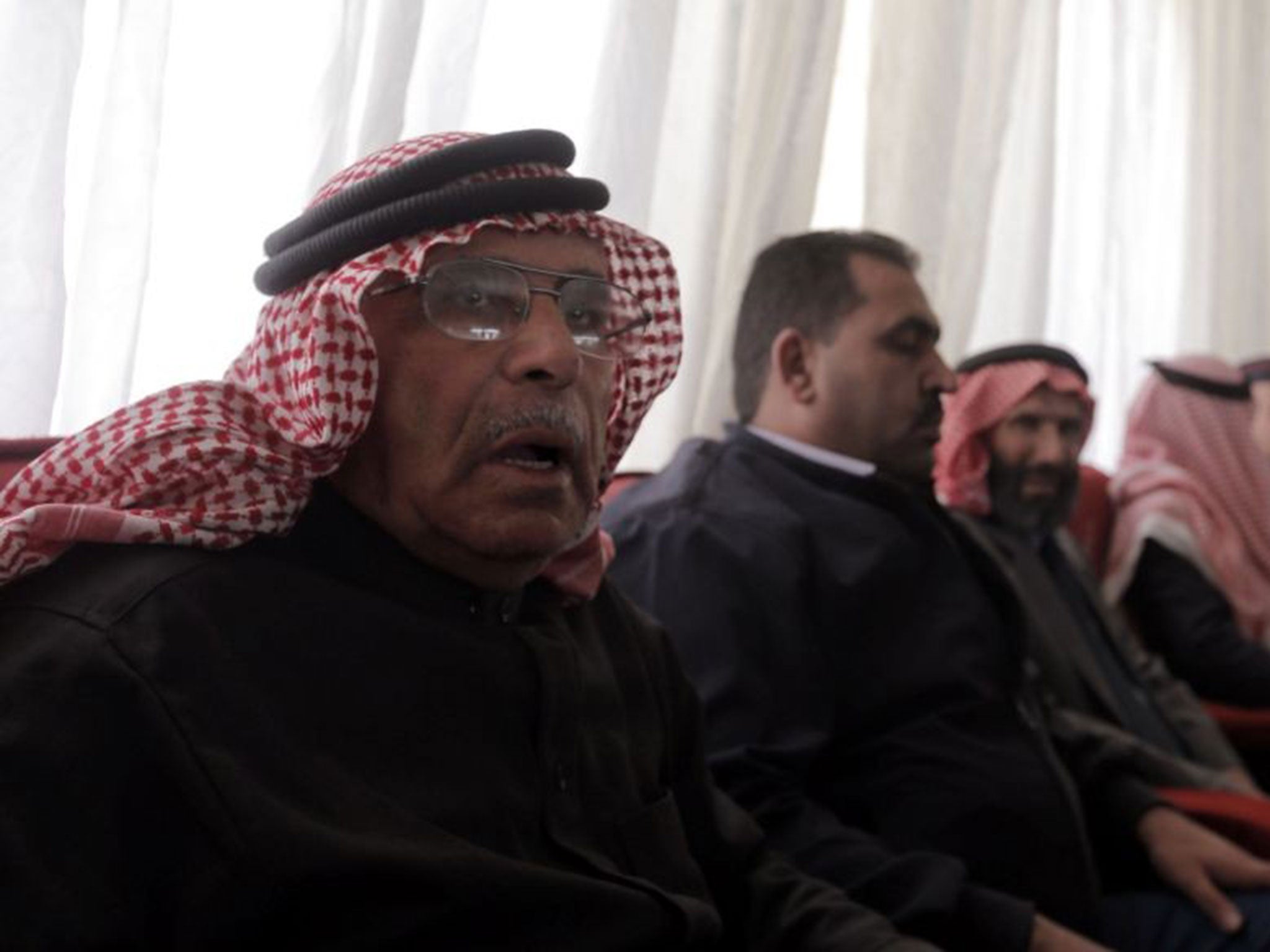 Safi al-Kassasbeh, the father of the Jordanian pilot killed by Isis militants, greets mourners who turned up to offer their condolences on 4 February , 2015