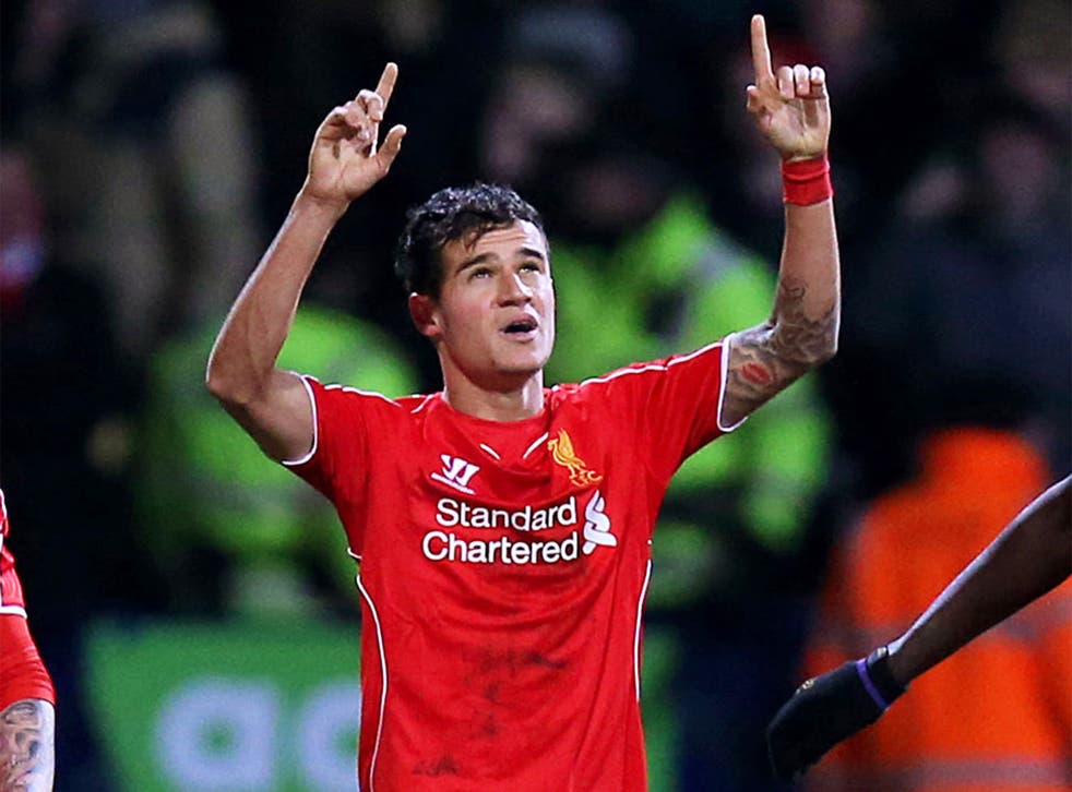 Philippe Coutinho celebrates scoring Liverpool’s 90th-minute winner in the 2-1 FA Cup victory over Bolton
