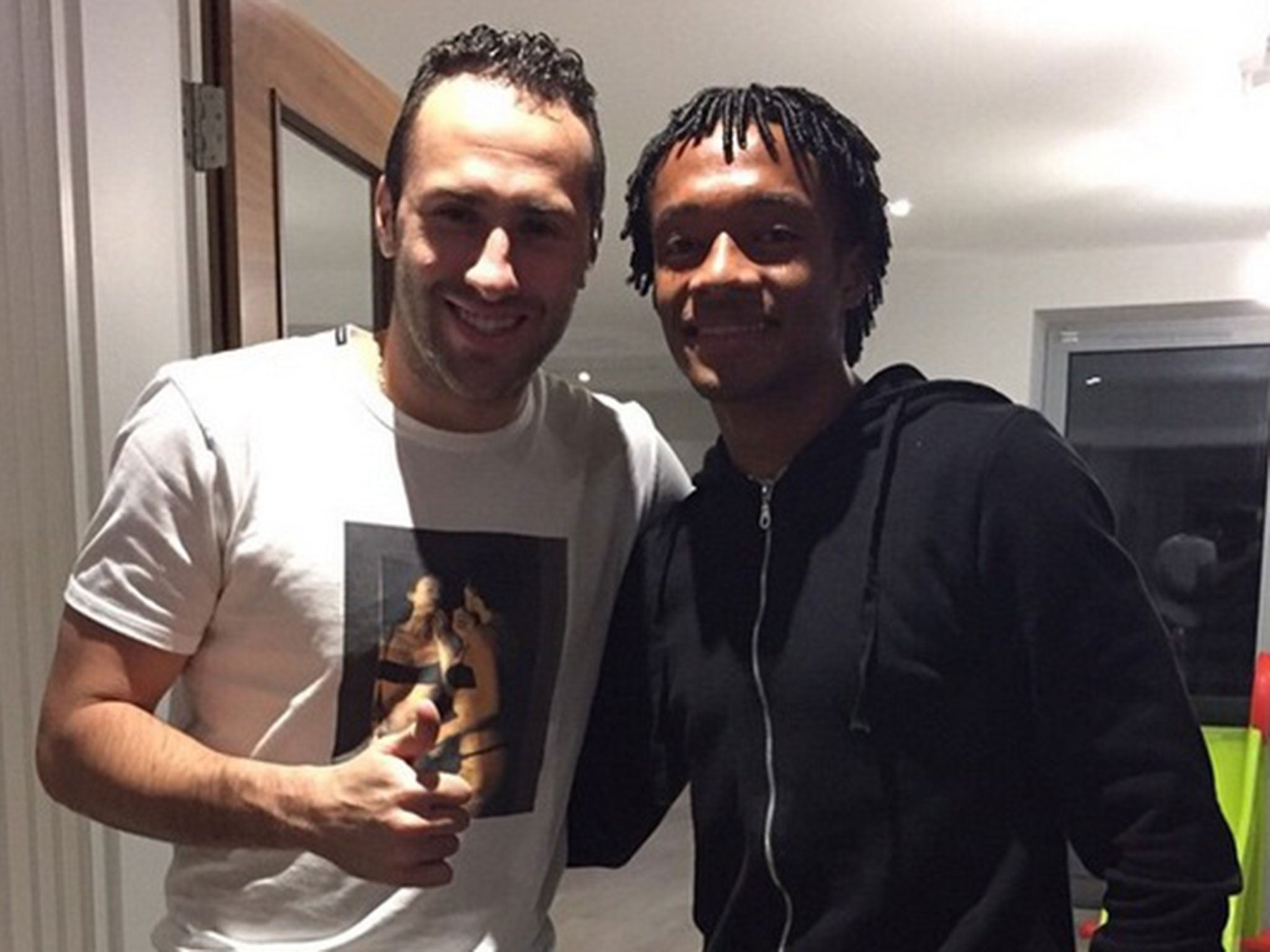 David Ospina (left) posted this picture with and Juan Cuadrado last night