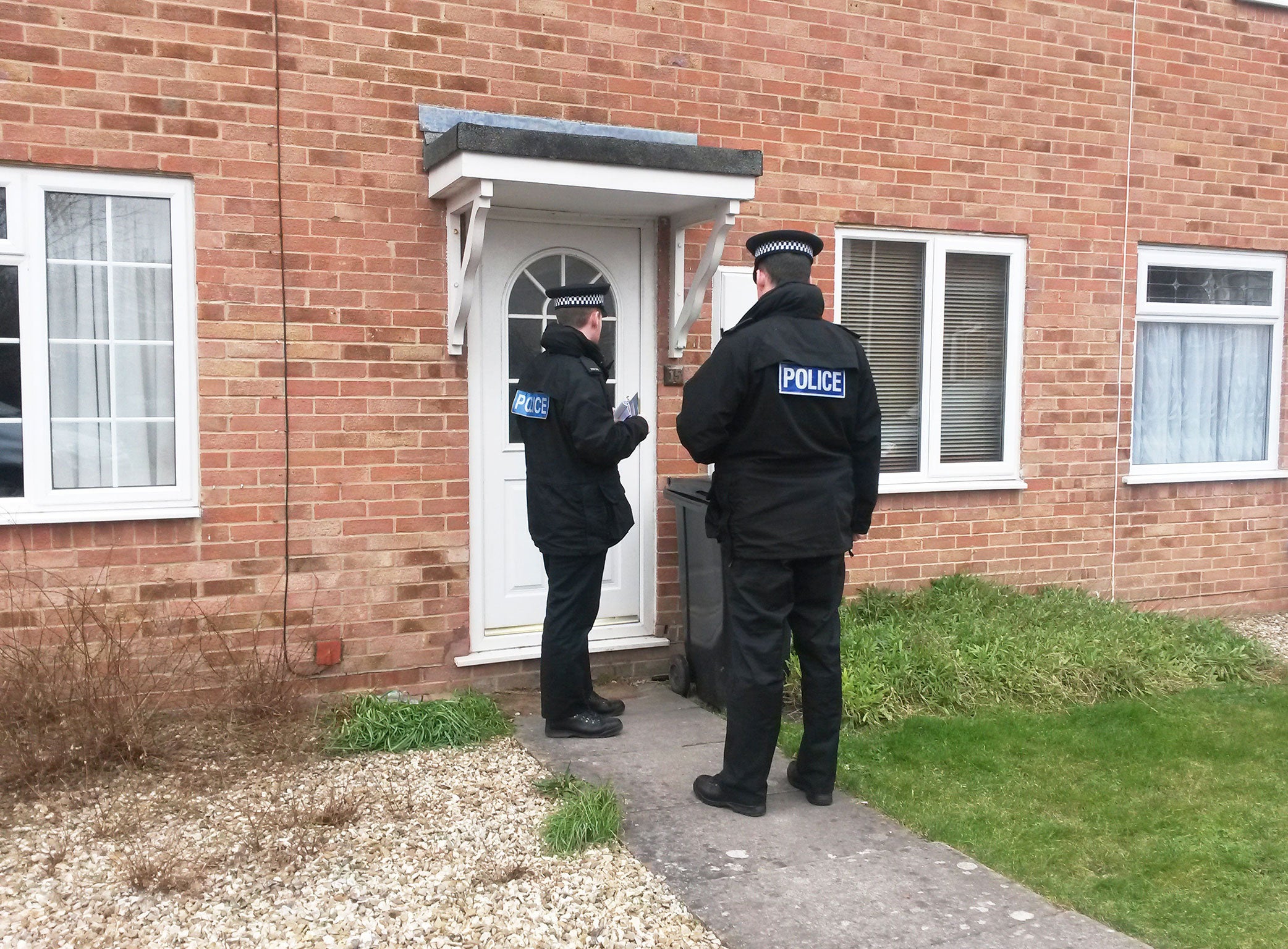Police conduct door-to-door inquiries after a mother was tied up and sexually assaulted at knifepoint in front of her young child in a burglary at her home