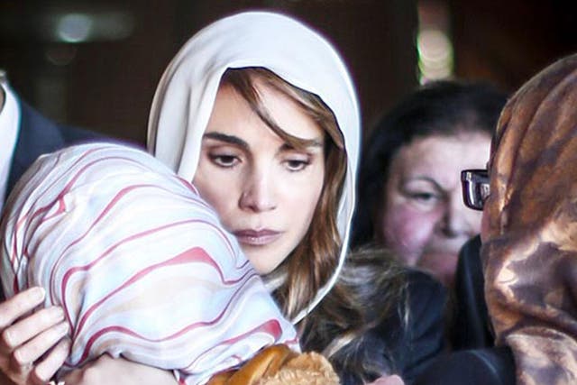 Jordan's Queen Rania offers her condolences to the family of Jordanian pilot Muath al-Kasaesbeh, at their family home of Muath in the city of Karak