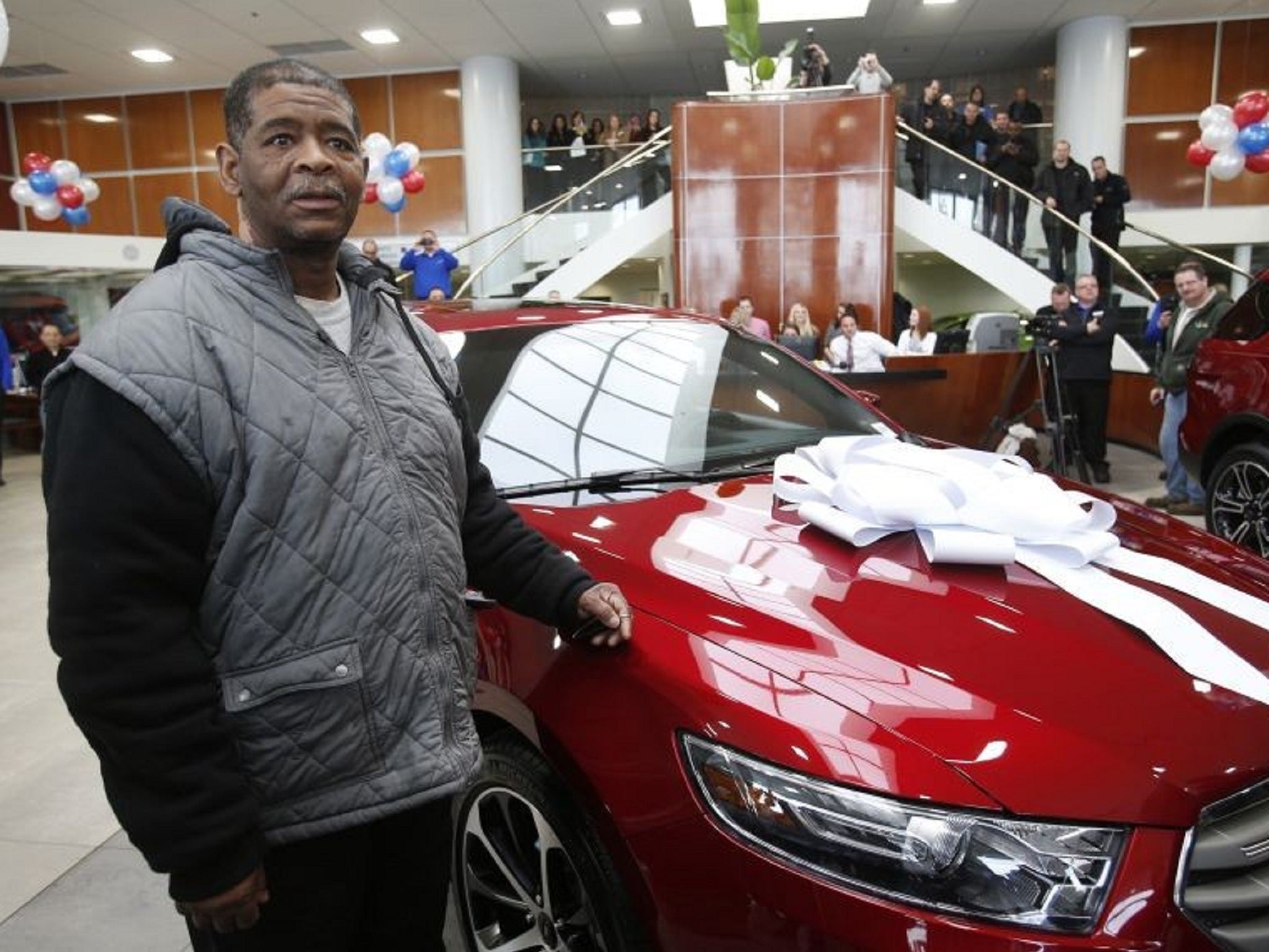 Mr Robertson was given a new car for free as well as $350,000