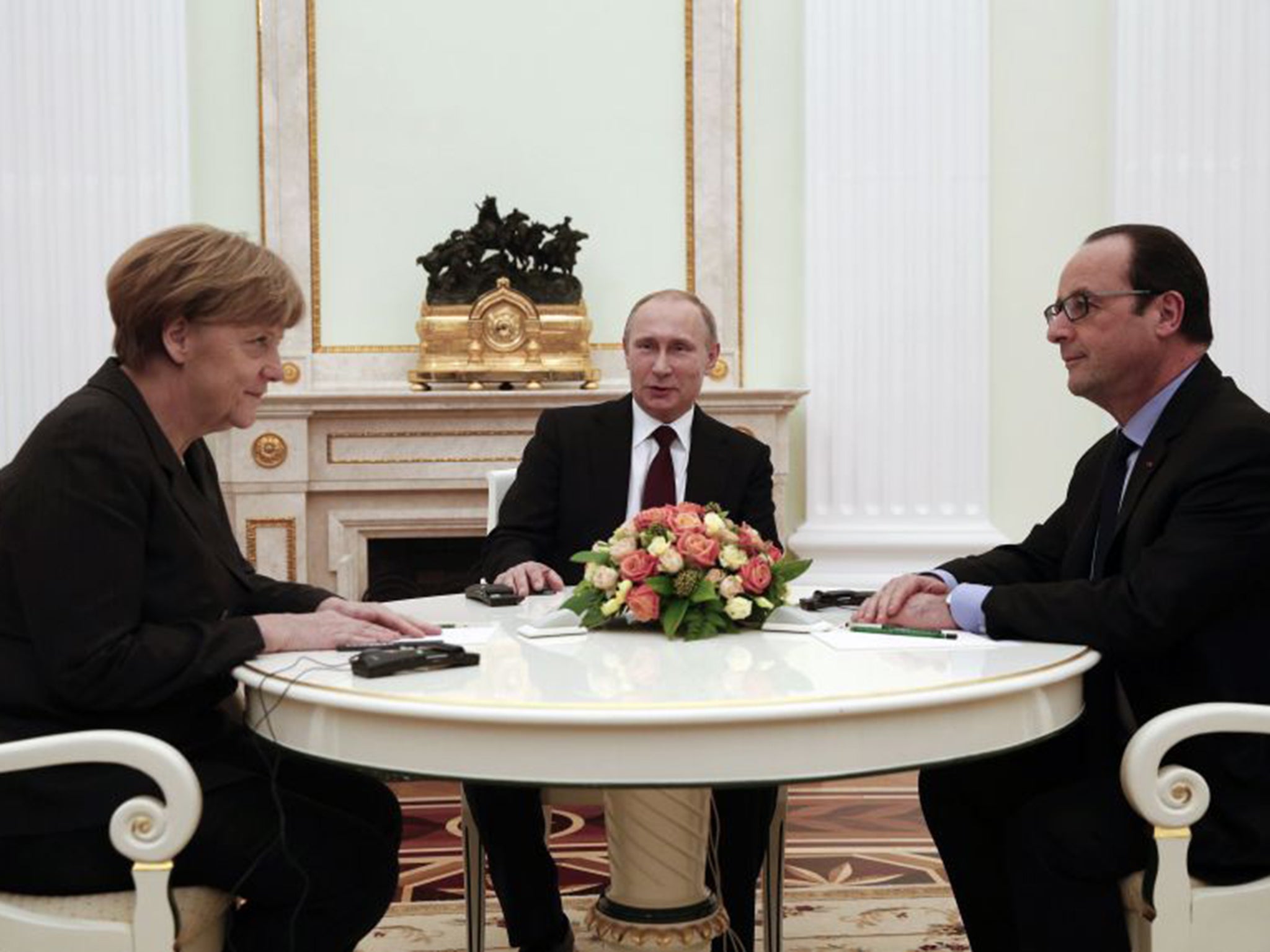 Angela Merkel, François Hollande and Vladmir Putin in Moscow on Friday
