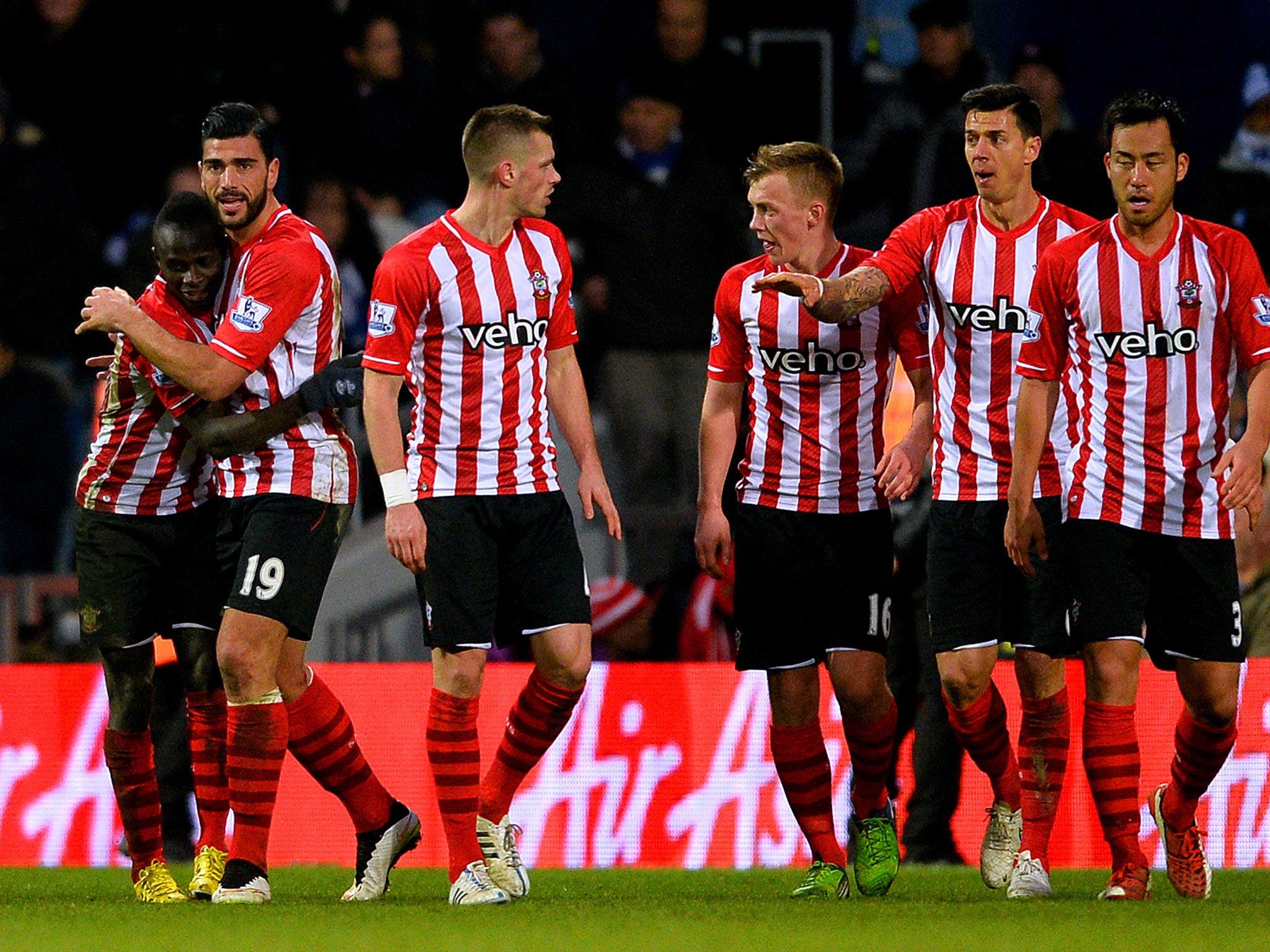 Sadio mane celebrates with his Southampton team-mates after his late goal against QPR