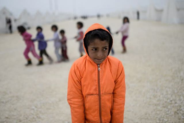 A young Syrian Kurdish refugee at a UNHCR camp in Suruc, Turkey