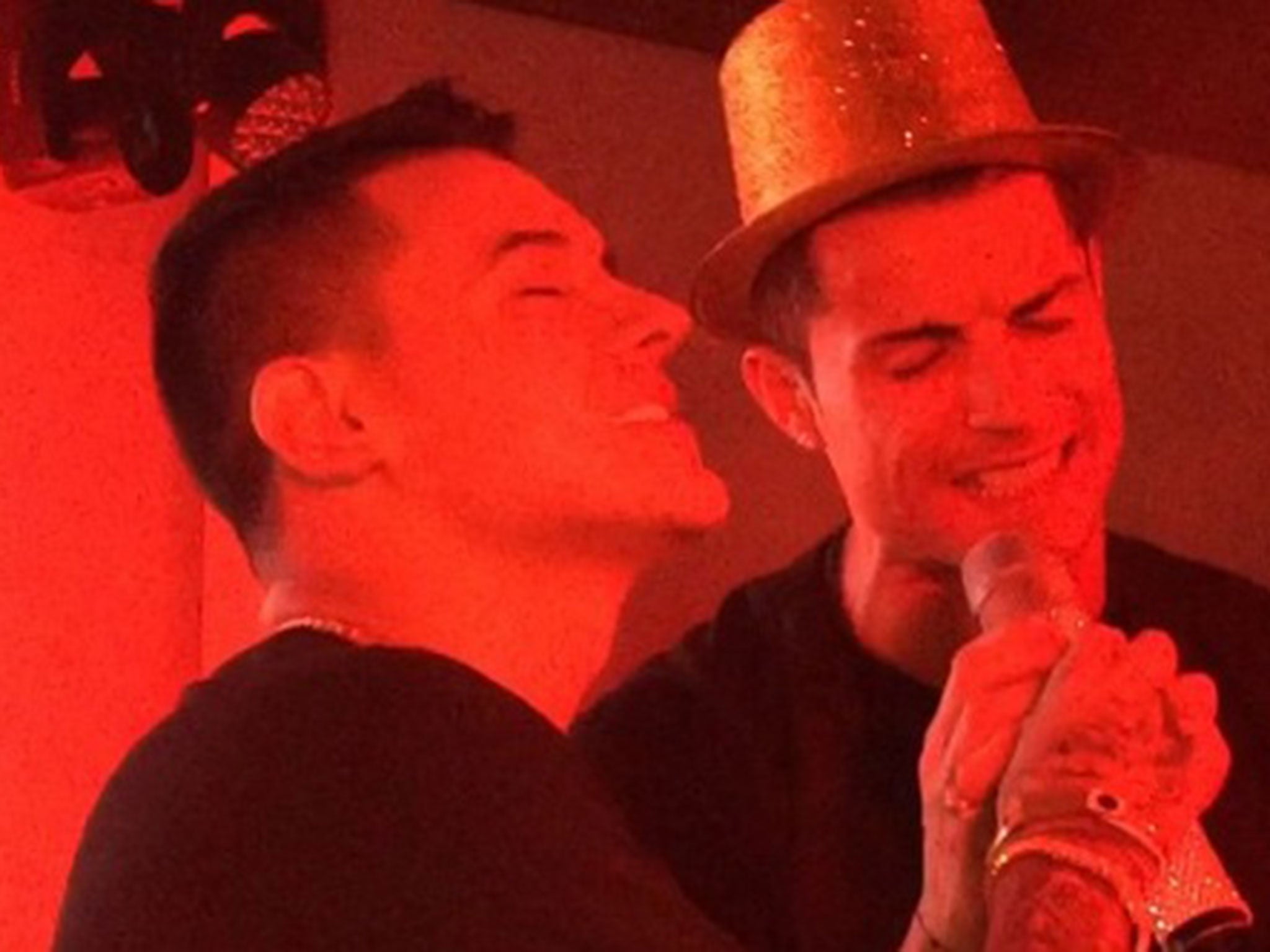 Kevin Roldan and Cristiano Ronaldo belting out a tune at Ronaldo's birthday party