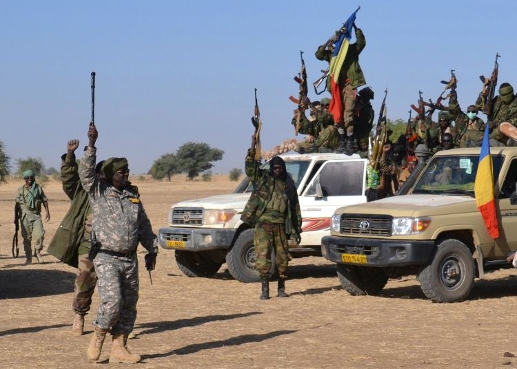 Chadian soldiers gather near the Nigerian town of Gamboru, just across the border from Cameroon. Chadian forces retook the town from Boko Haram, which seized control months ago