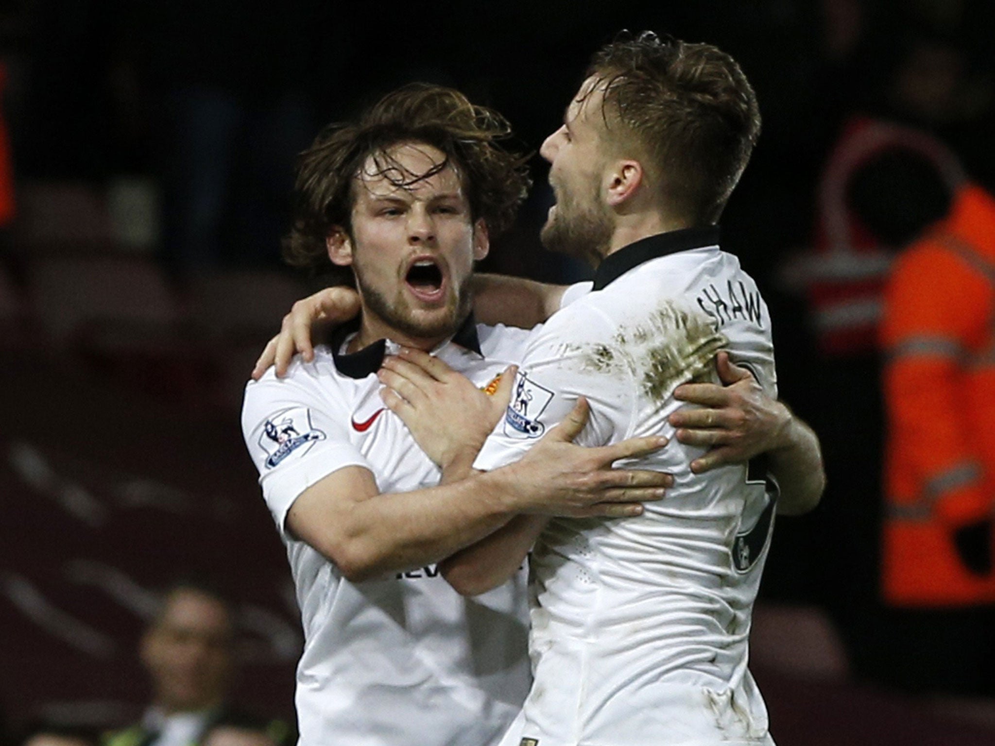 Daley Blind celebrates with Luke Shaw after equalising for Manchester United