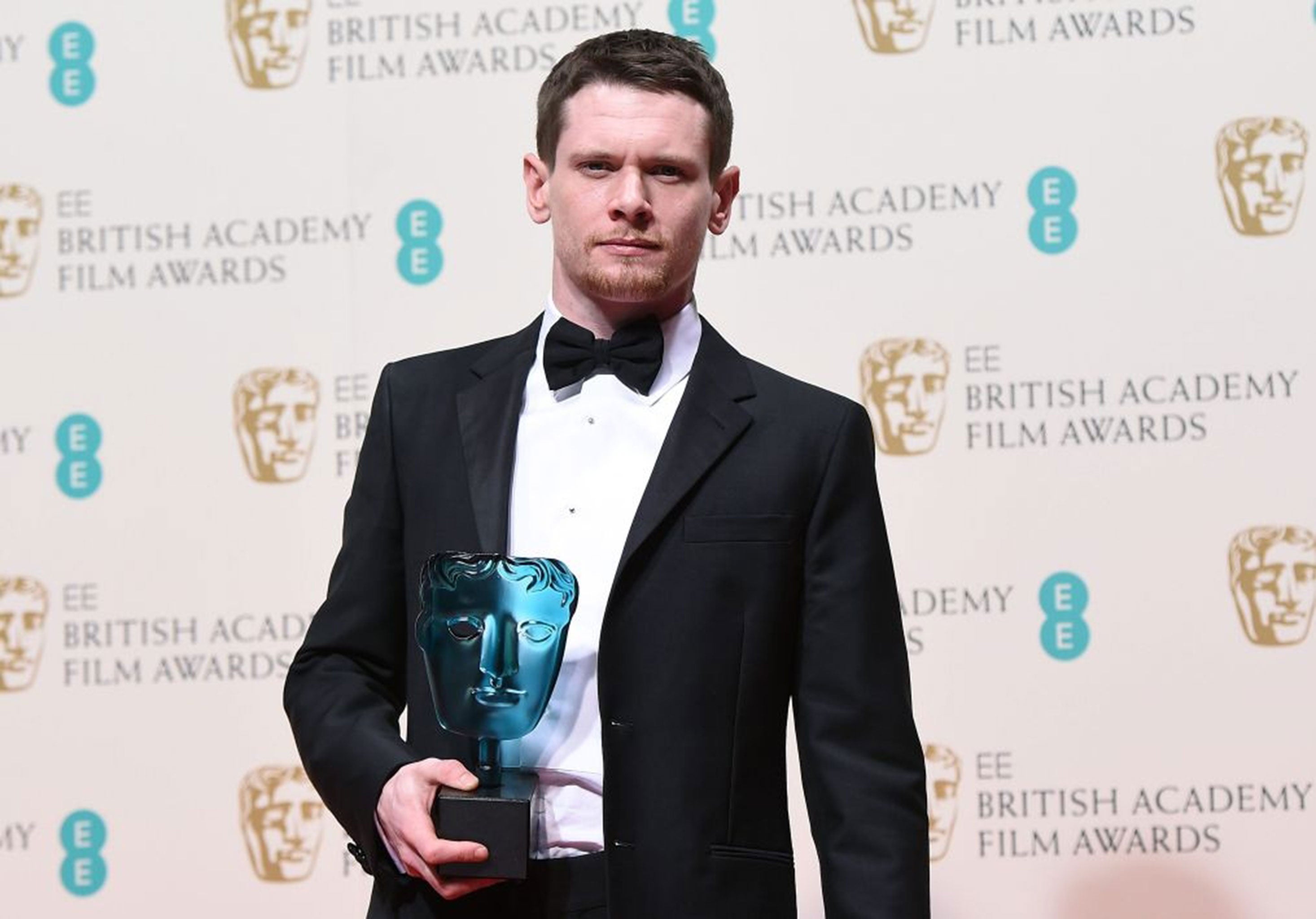British actor Jack O'Connell poses in the press room after winning the EE Rising Star award