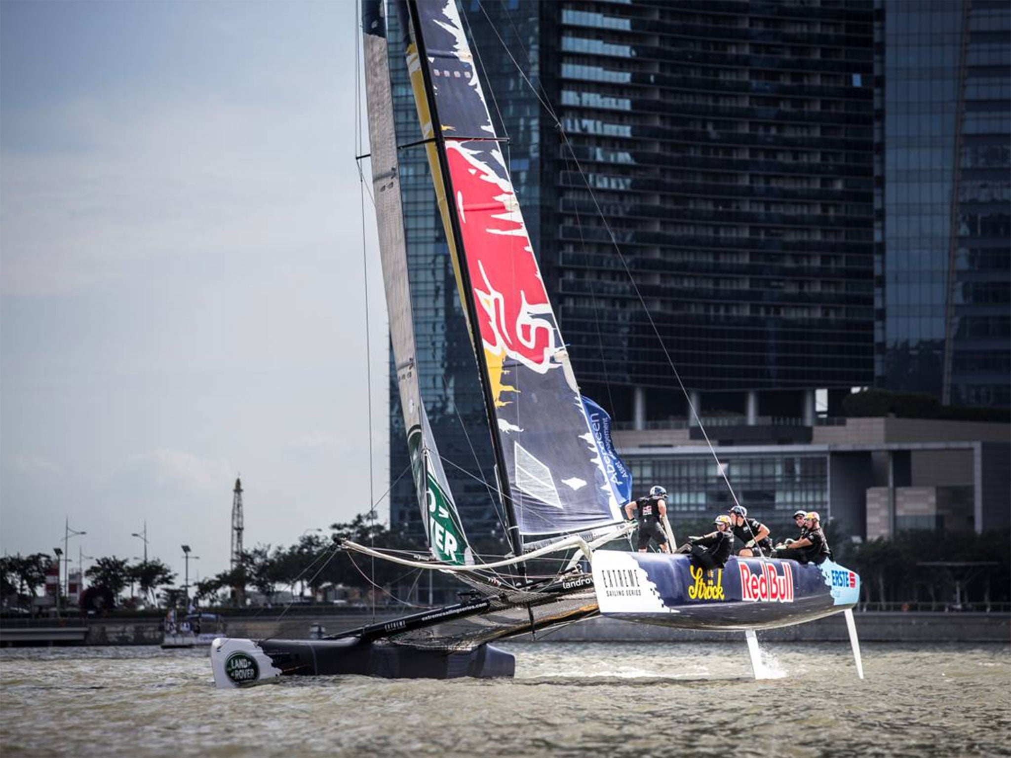 They have been trying for the last five years but Roman Hagara’s Red Bull team finally topped the podium at the Singapore 2015 opener of the Extreme Sailing Series.