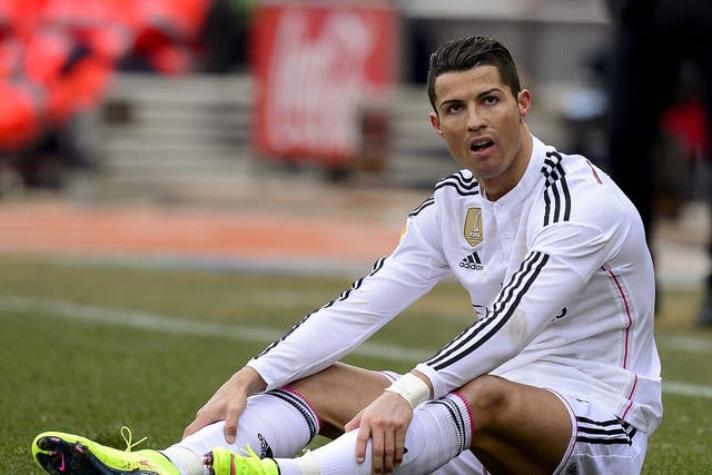 Cristiano Ronaldo reacts during the 4-0 defeat to Atletico