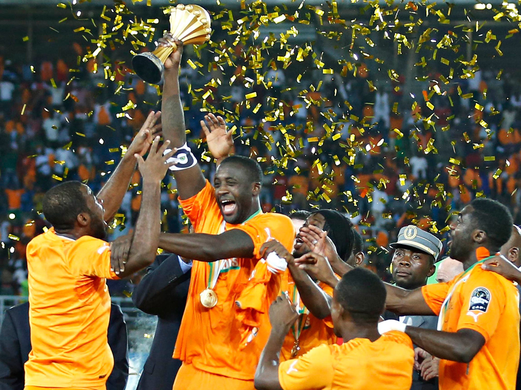 Yaya Toure celebrates with team mates after winning the African Nations Cup