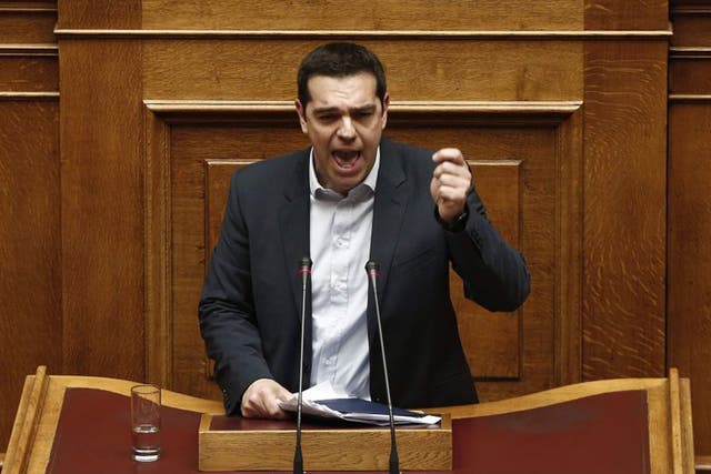 Alexis Tsipras delivers his first major speech in parliament in Athens on Sunday 