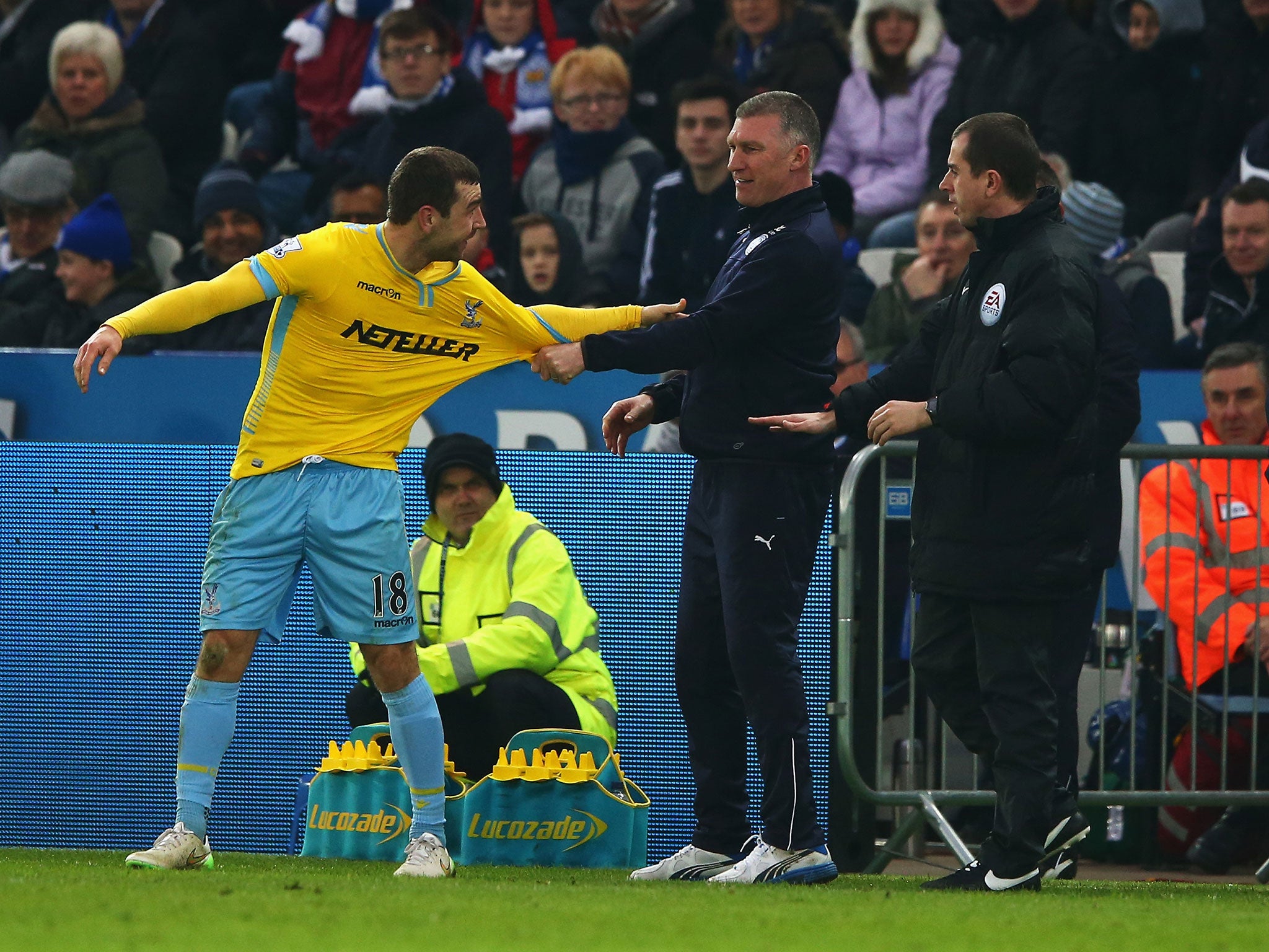 The Leicester City manager, Nigel Pearson, tangles with the Crystal Palace midfielder James McArthur