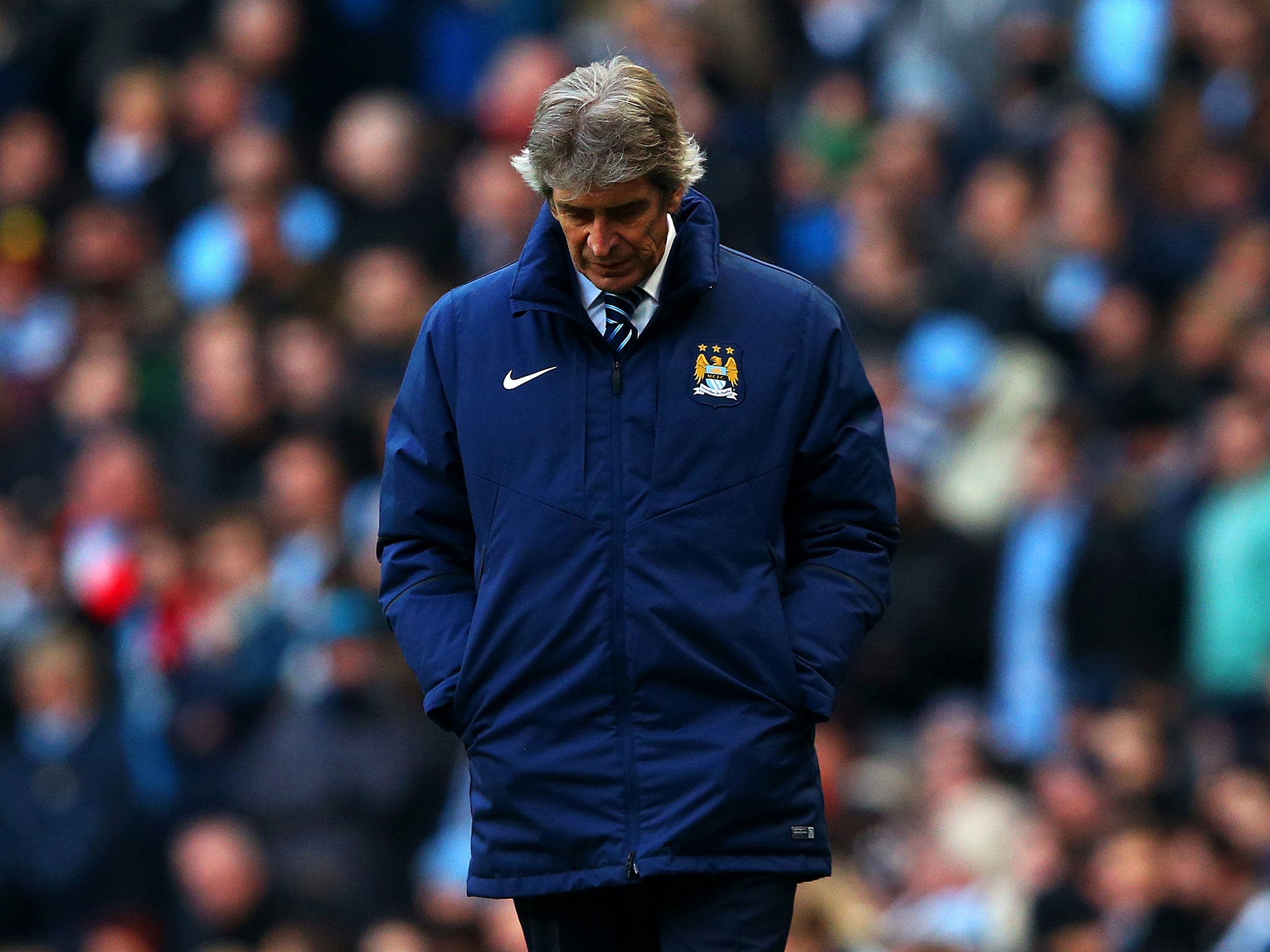 Manchester City manager Manuel Pellegrini claims he 'does not feel pressure'