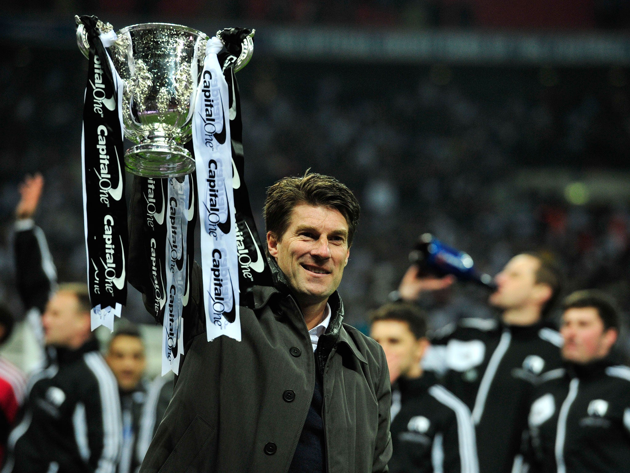 Laudrup celebrates winning the Capital One Cup in 2013