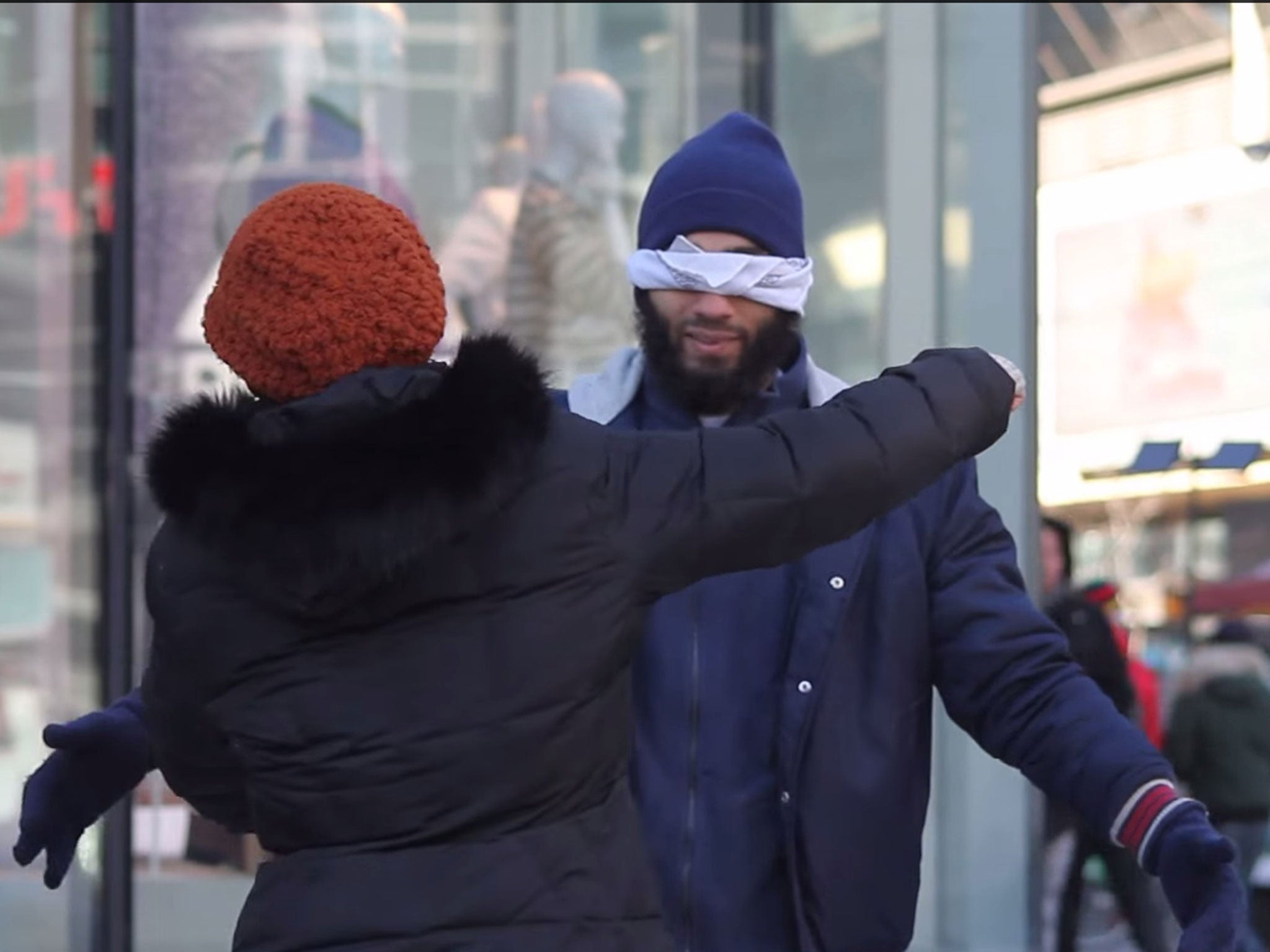 Blindfolded Muslim asks people to 'show trust with a hug' in heartwarming social experiment