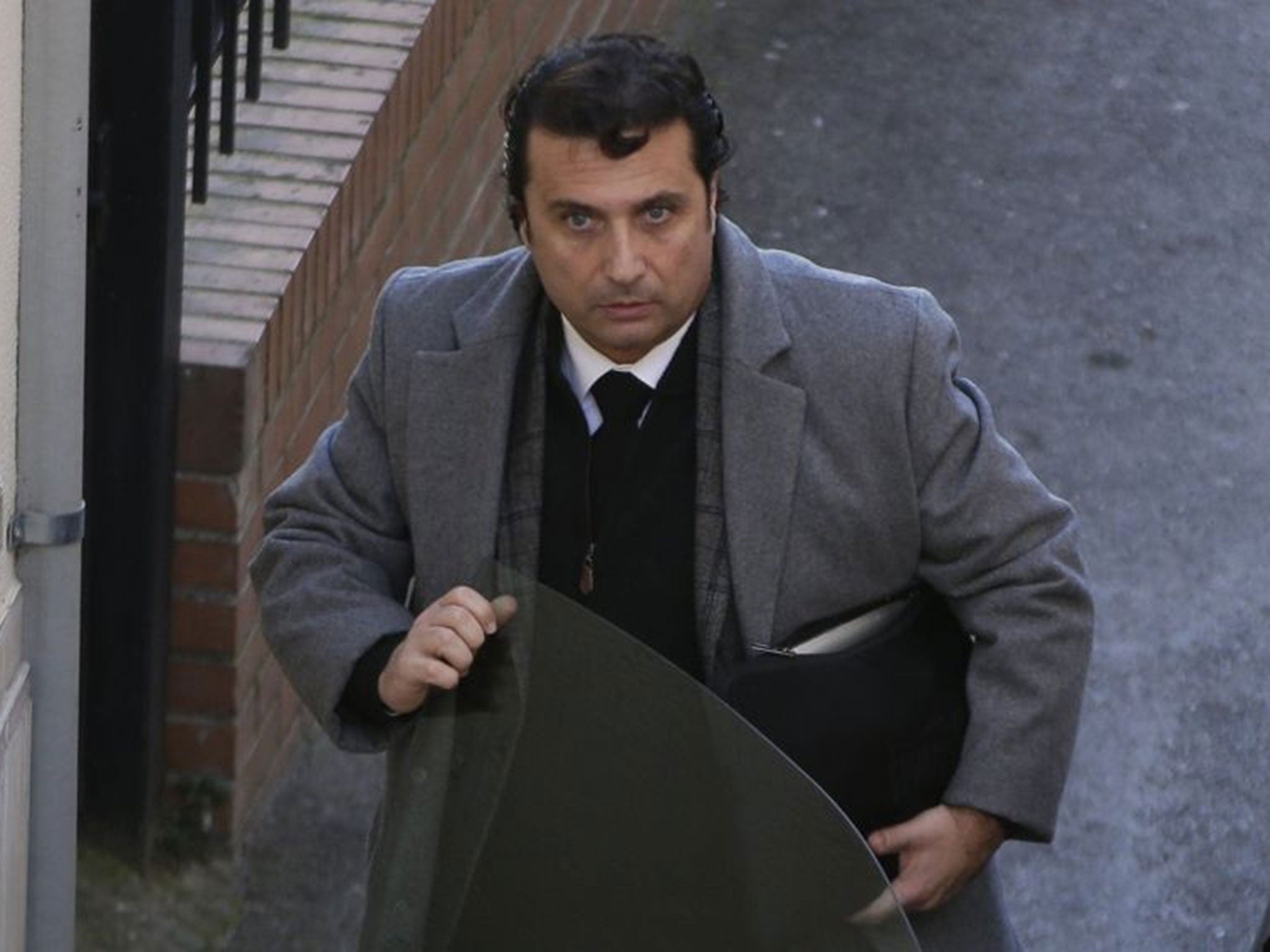 Captain of the Costa Concordia cruise liner Francesco Schettino arrives for his trial in Grosseto today