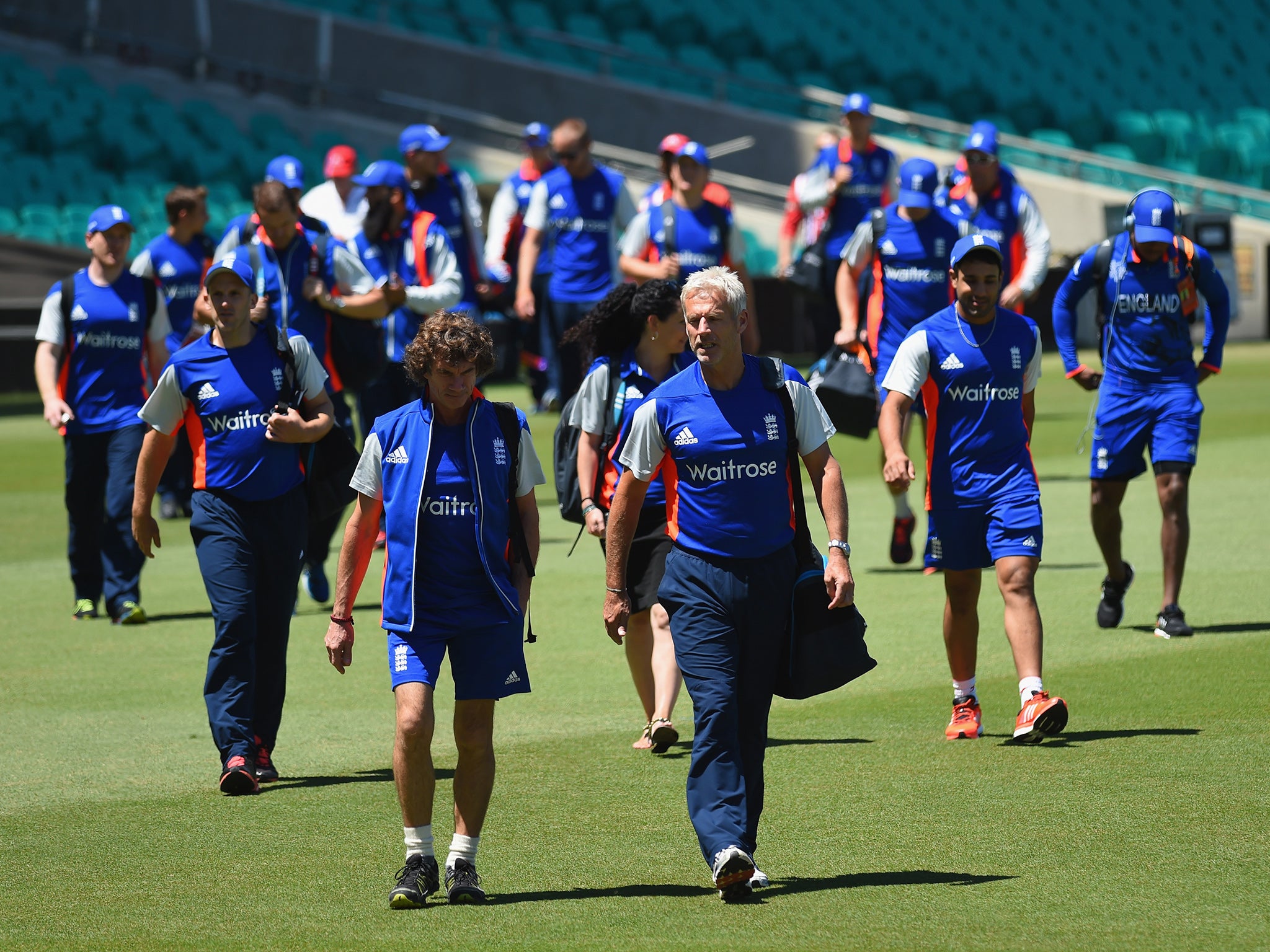 England coach Peter Moores leads his side out to train