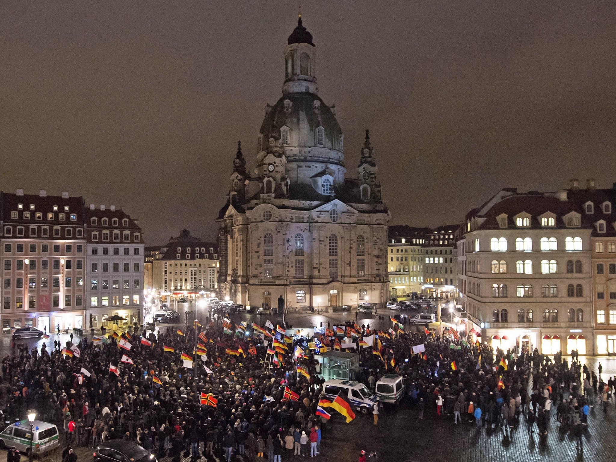 A far-right Pegida rally outside the Frauenkirche church in Dresden – their protests have attracted crowds of up to 25,000 people