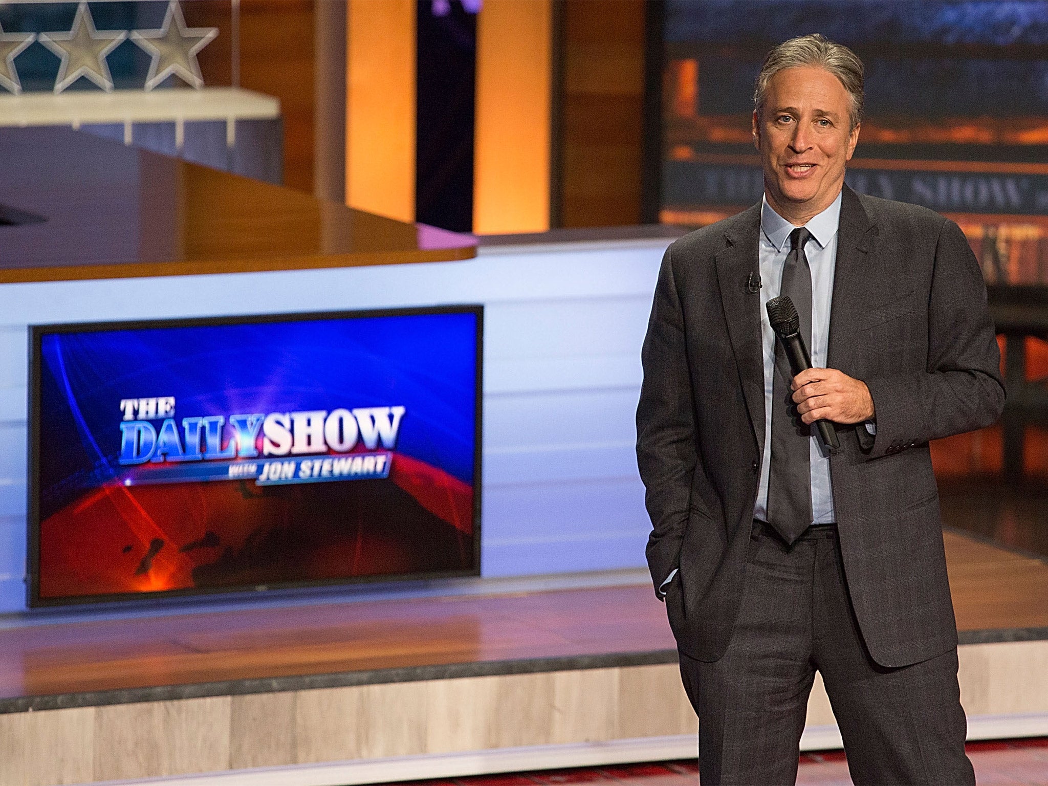 Jon Stewart took his place behind the Daily Show desk in 1999