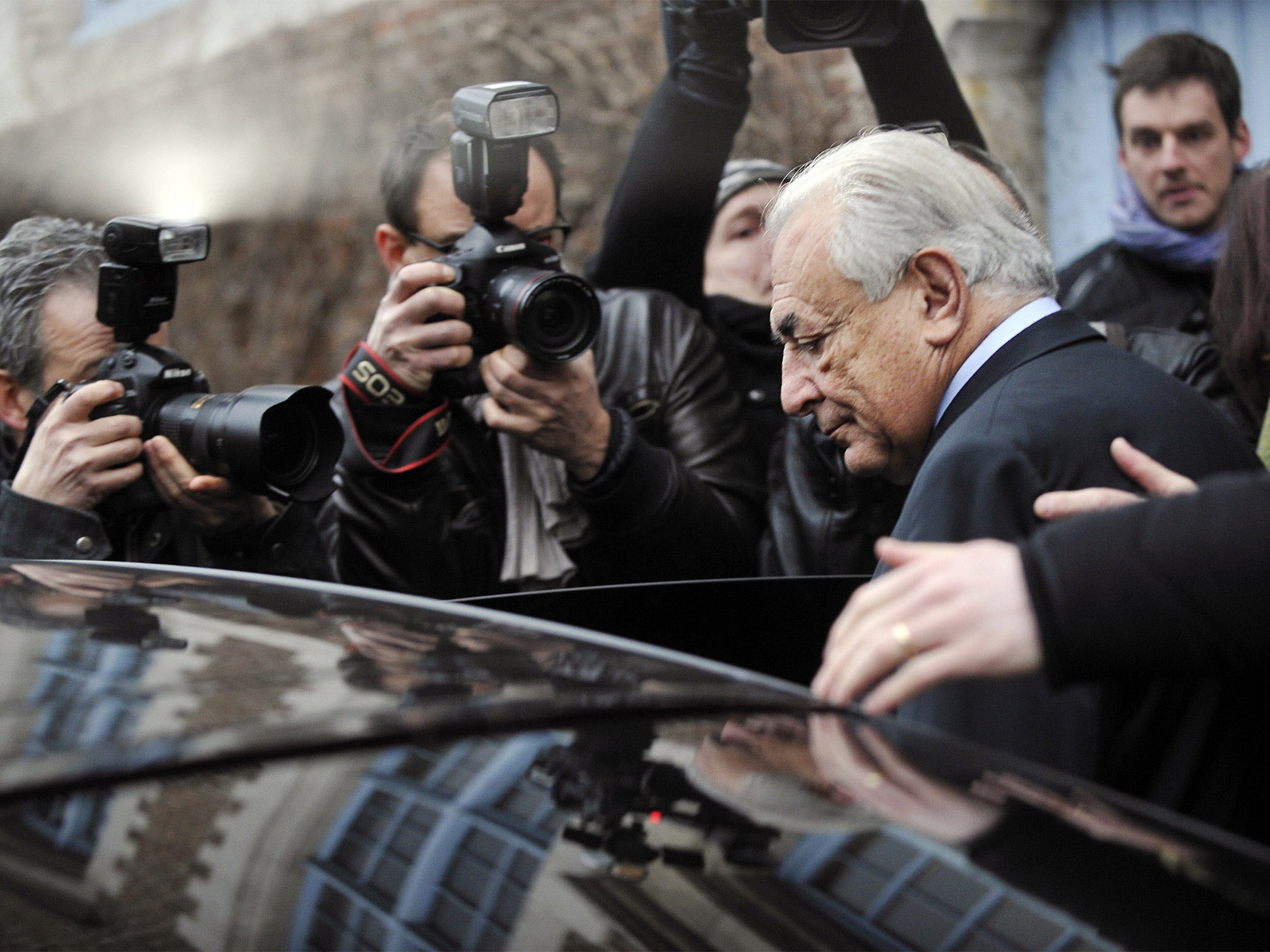 Dominique Strauss-Kahn leaving his hotel in Lille to attend his trial