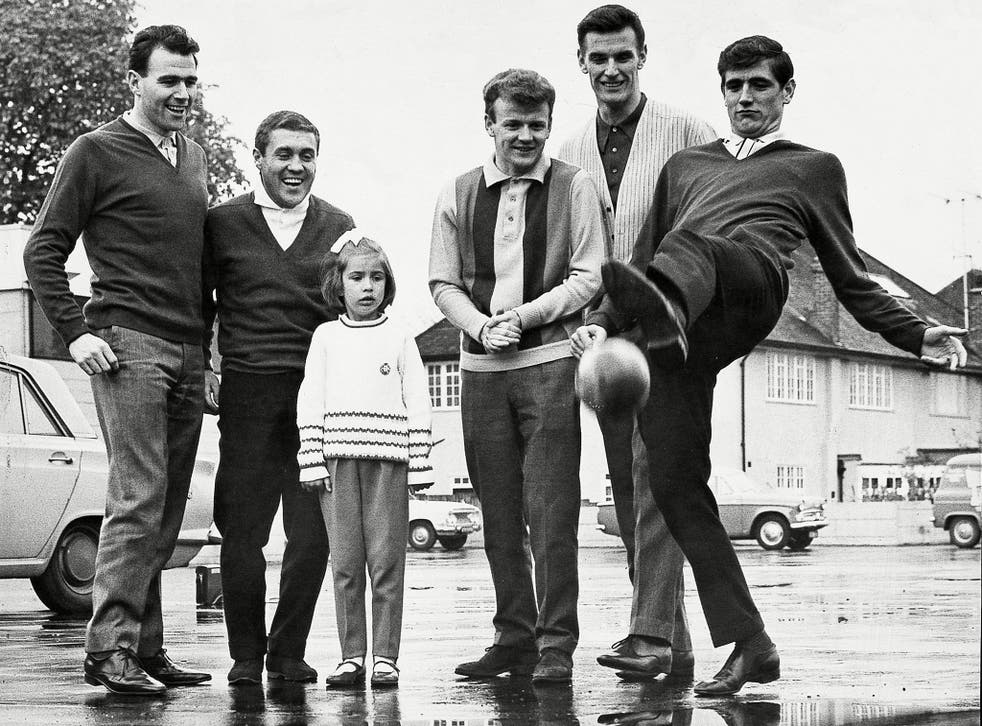 Leeds players and a young fan before the 1965 FA Cup final: left to right, Storrie, Bobby Collins, Billy Bremner, Alan Peacock and Norman Hunter