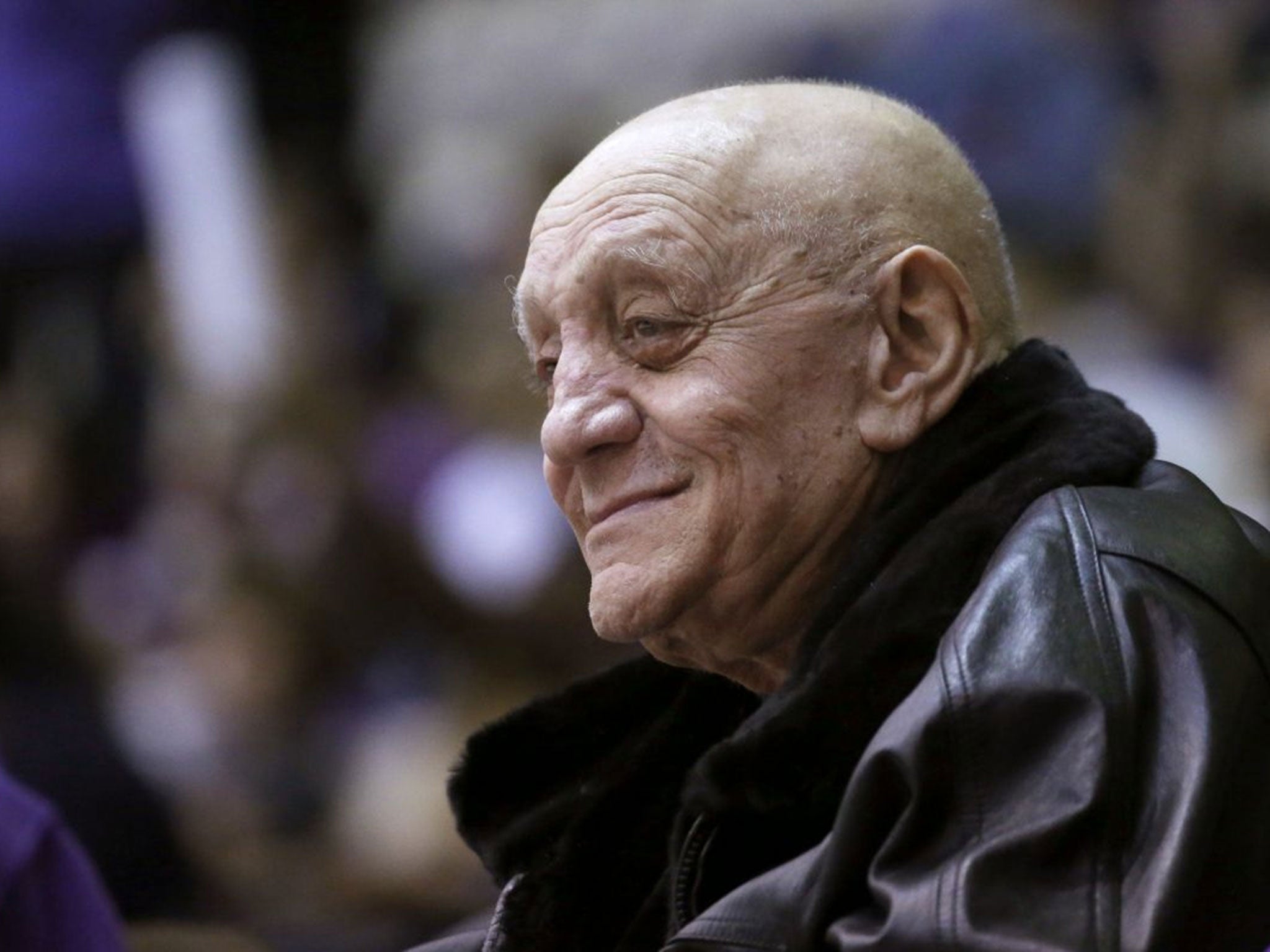 Jerry Tarkanian watches his granddaughter Dannielle Diamant playing basketball