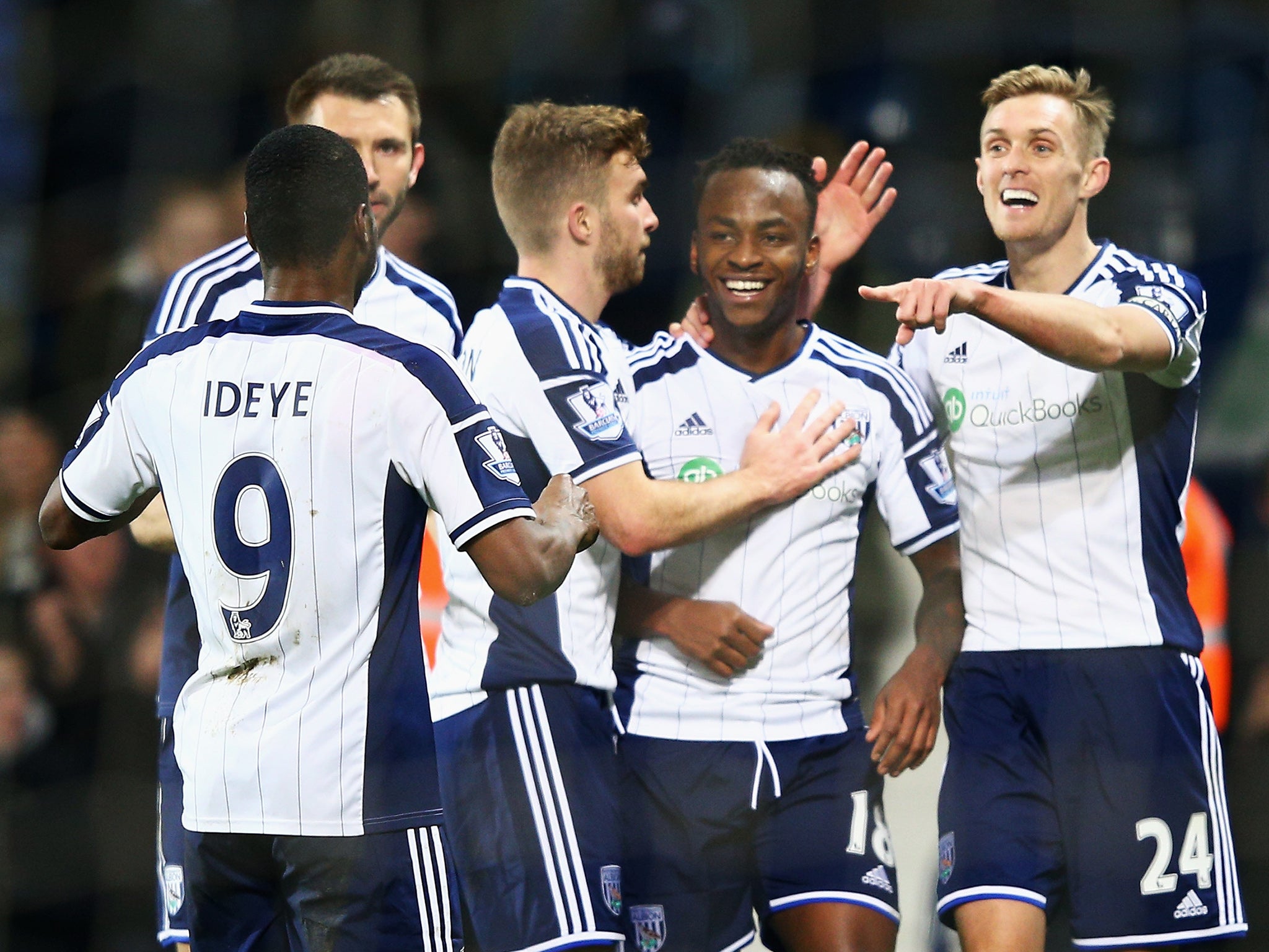 Saido Berahino celebrates with team-mates after his goal made sure