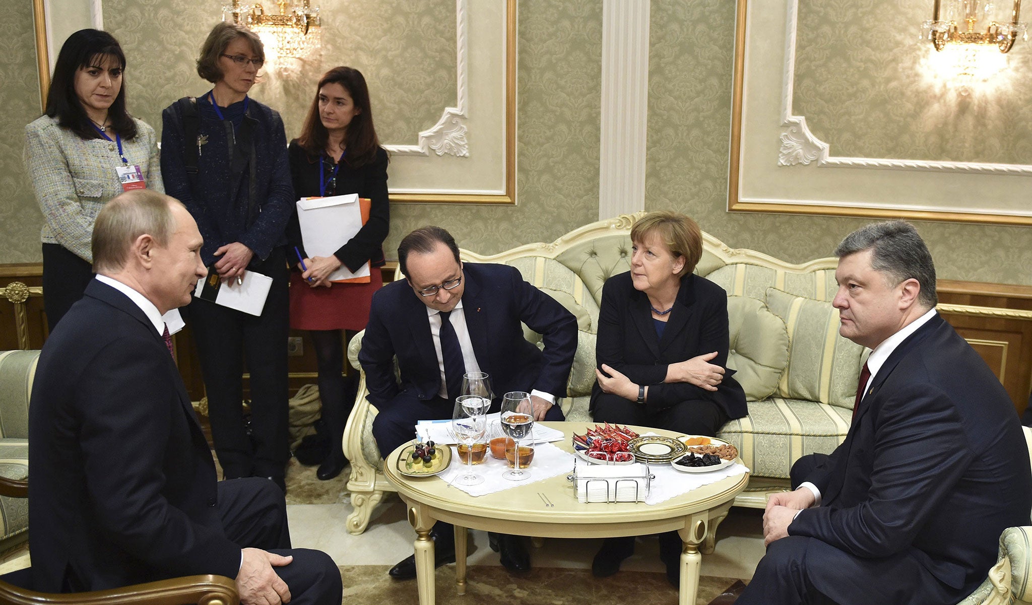 Talks between Vladimir Putin, Francois Hollande, Angela Merkel and Petro Poroshenko have last through the night