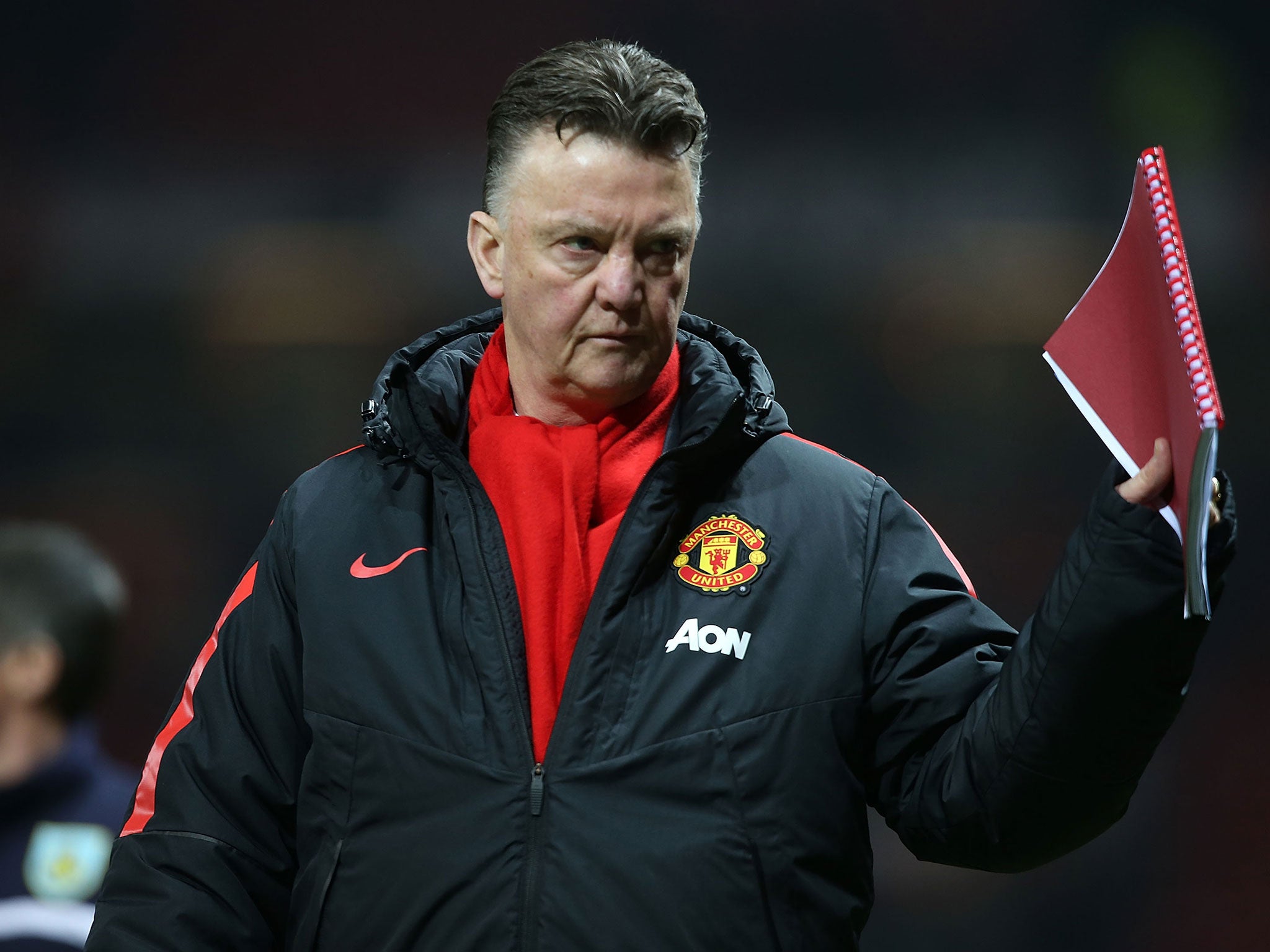 Manchester United manager Louis van Gaal leaves the field after the Burnley win