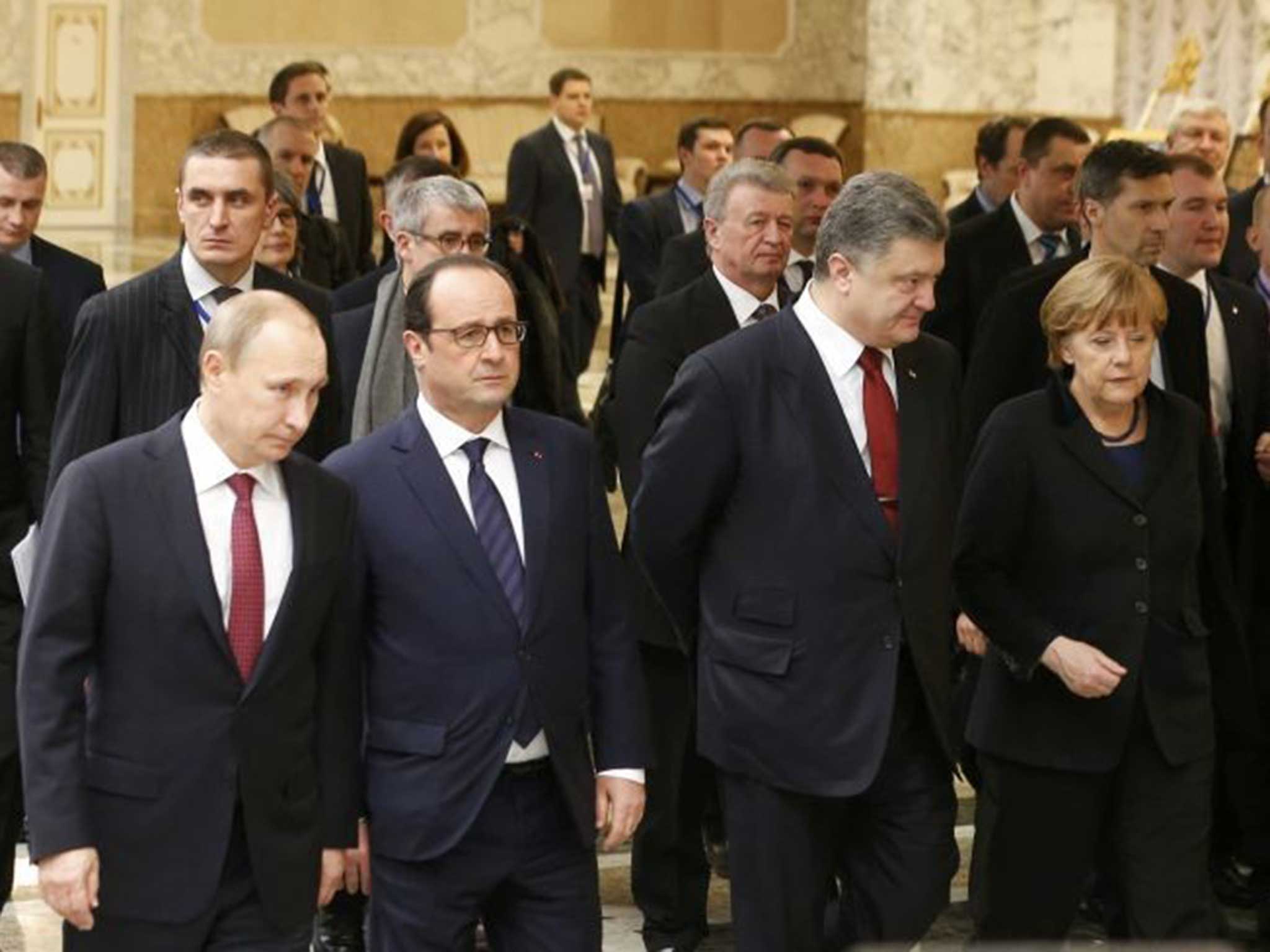 No smiles: Vladimir Putin, Francois Hollande, Petro Poroshenko and Angela Merkel