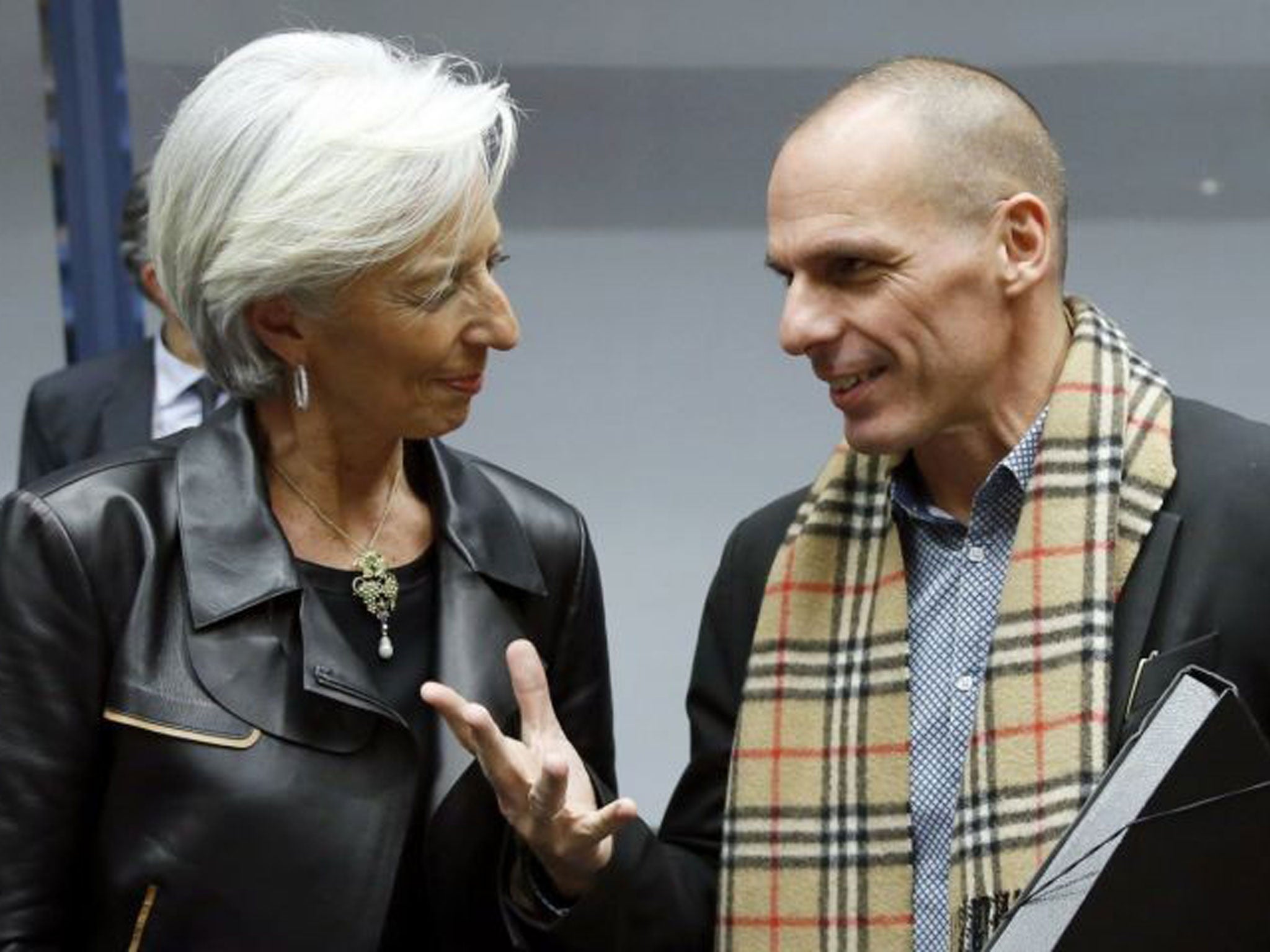 International Monetary Fund (IMF) managing mirector Christine Lagarde listens to Greek Finance Minister Yanis Varoufakis during a eurozone finance ministers meeting to discuss Athens' plans to reverse austerity measures agreed as part of its bailout