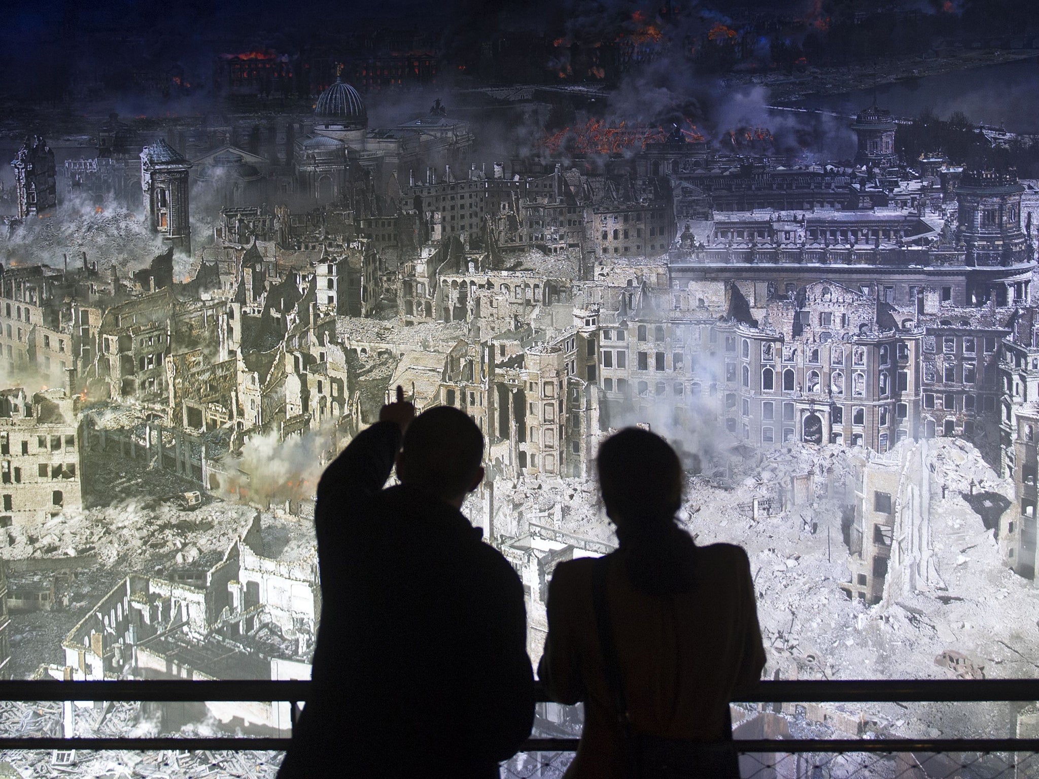 City of dust: visitors to an exhibition in Dresden study a 360-degree panorama of
the city after the Allied raids in February 1945