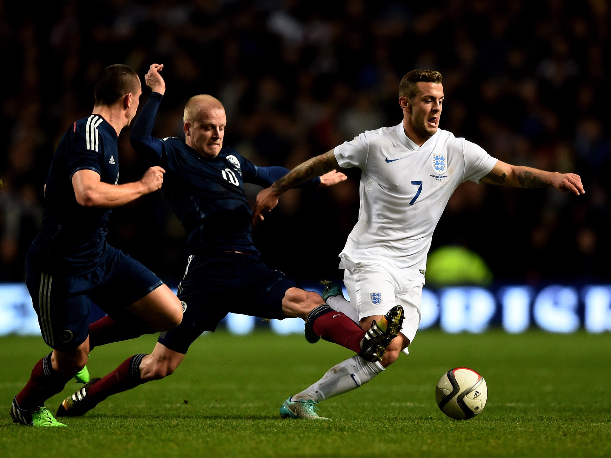 Jack Wilshere in action against Scotland in November. Controversy about the
midfielder and smoking will not affect his prospects for England’s next fixtures, says
manager Roy Hodgson