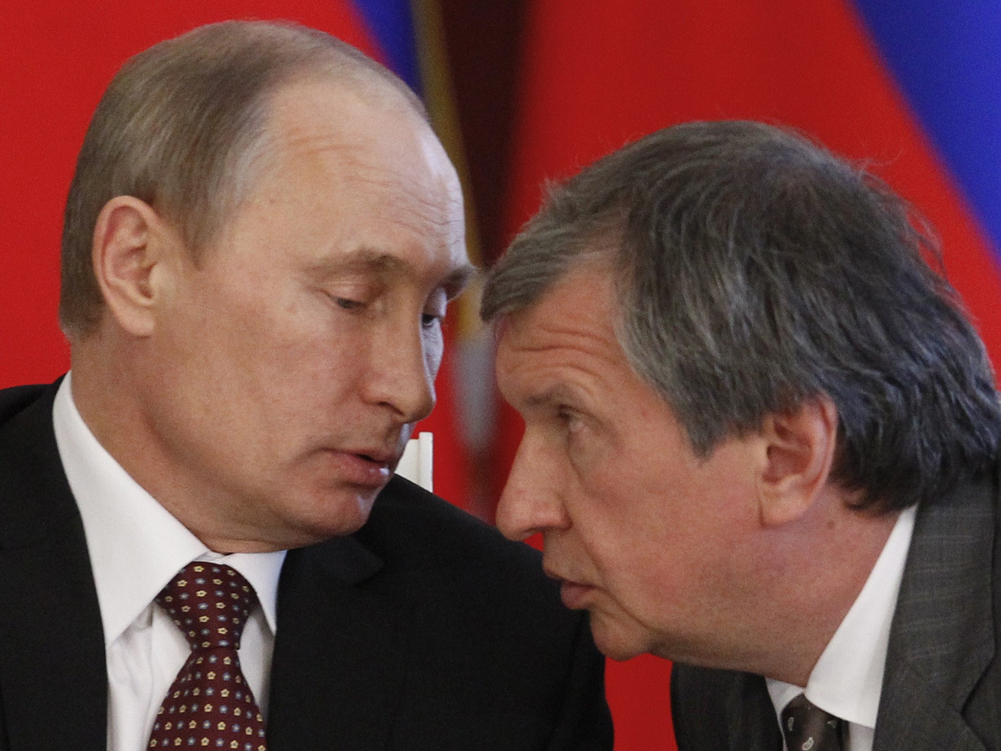 Russian President Vladimir Putin talks to Igor Sechin during a meeting at the Kremlin in 2013