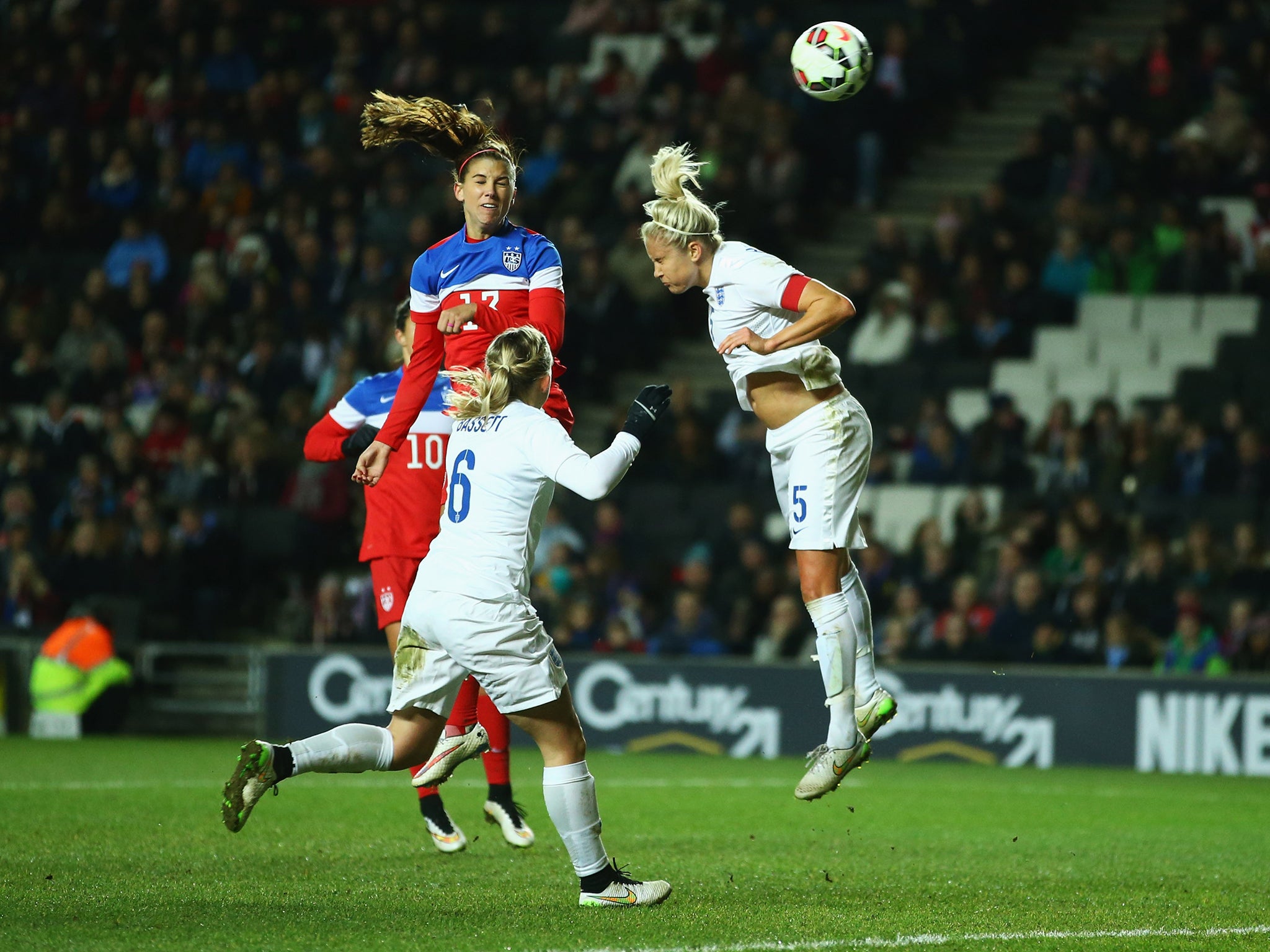 Alex Morgan rises above the England defence to score the only goal of the game