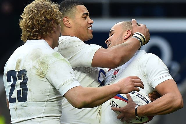 Billy Twelvetrees and Luther Burrell celebrates with Jonathan Joseph after he scores his second try