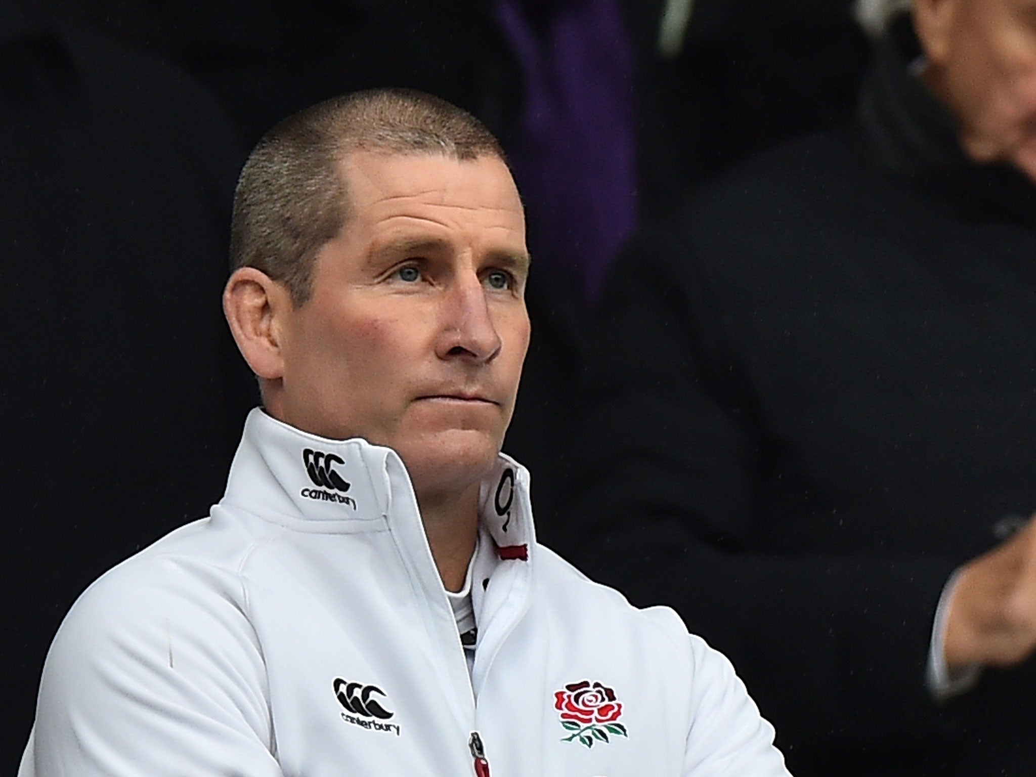 Stuart Lancaster watches on from the stands at Twickenham