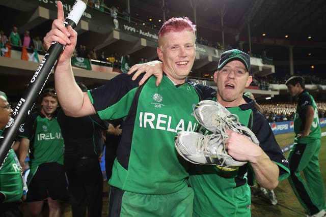 Kevin O’Brien (left) celebrates with Niall O’Brien after Ireland beat England in 2011