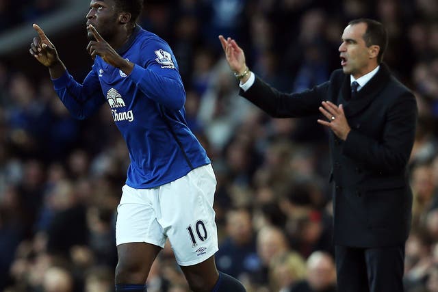 New heights: Roberto Martinez (right) deserves better than to hear Romelu Lukaku saying he wants to move on up to ‘a big club’
